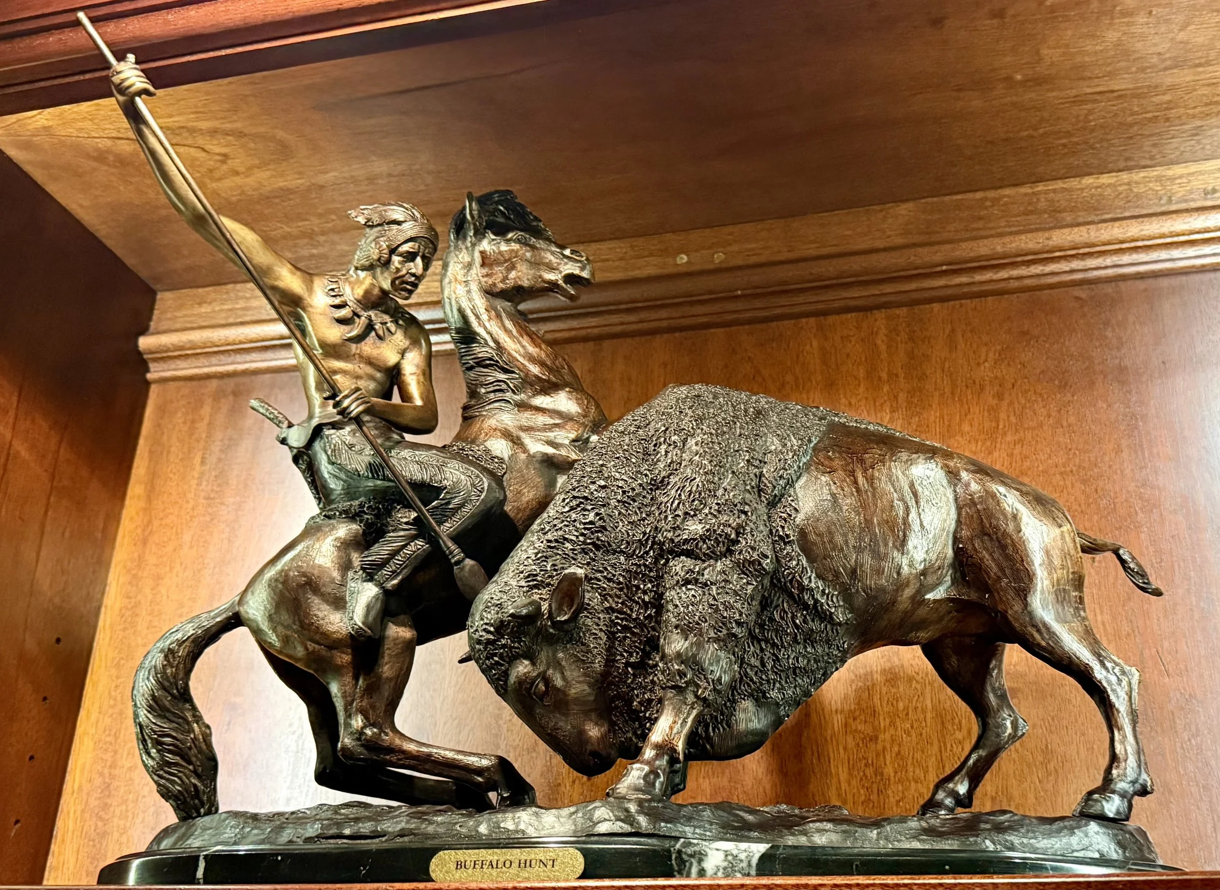 Buffalo hunt bronze sculpture