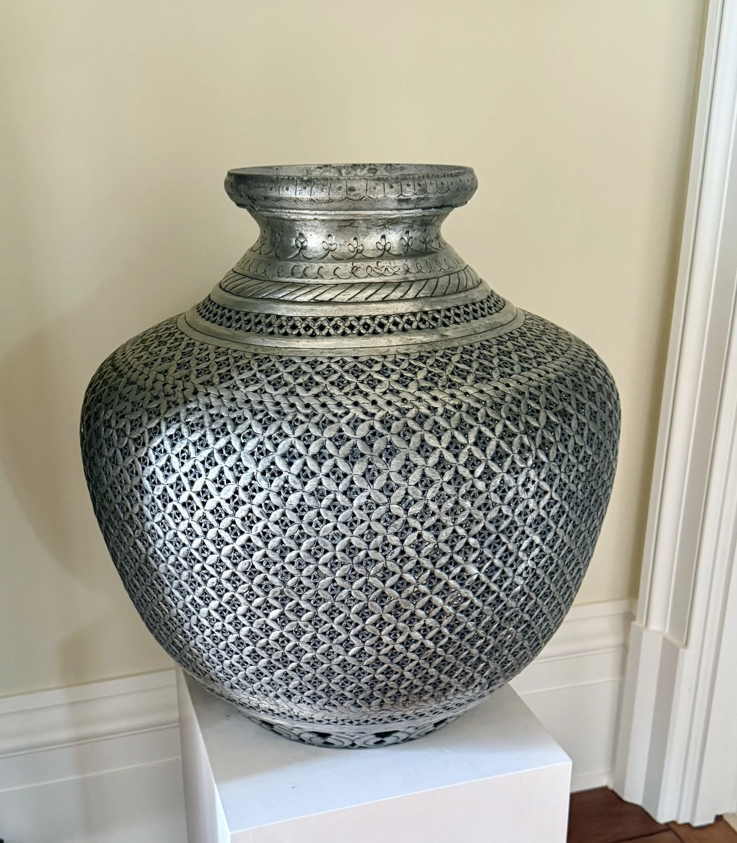 Hand-hammered metal vase/urn
