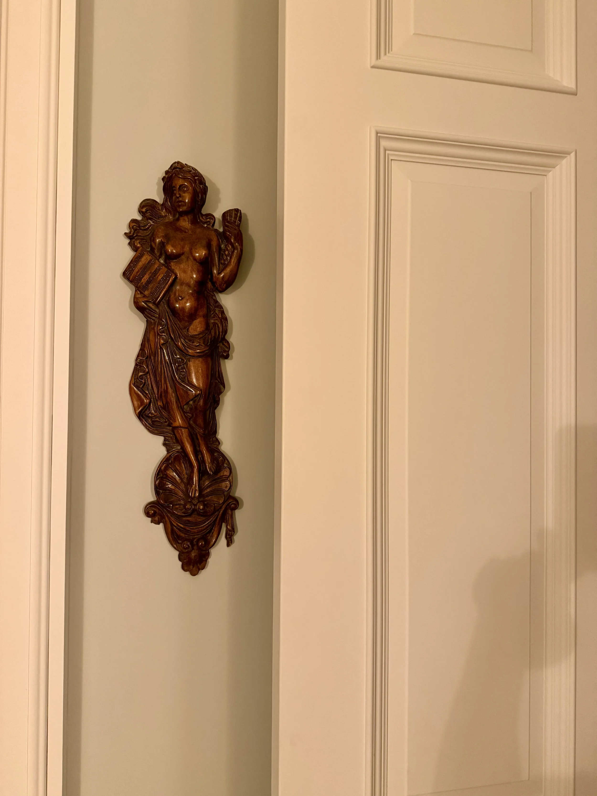 Pair of antique carved walnut relief panels