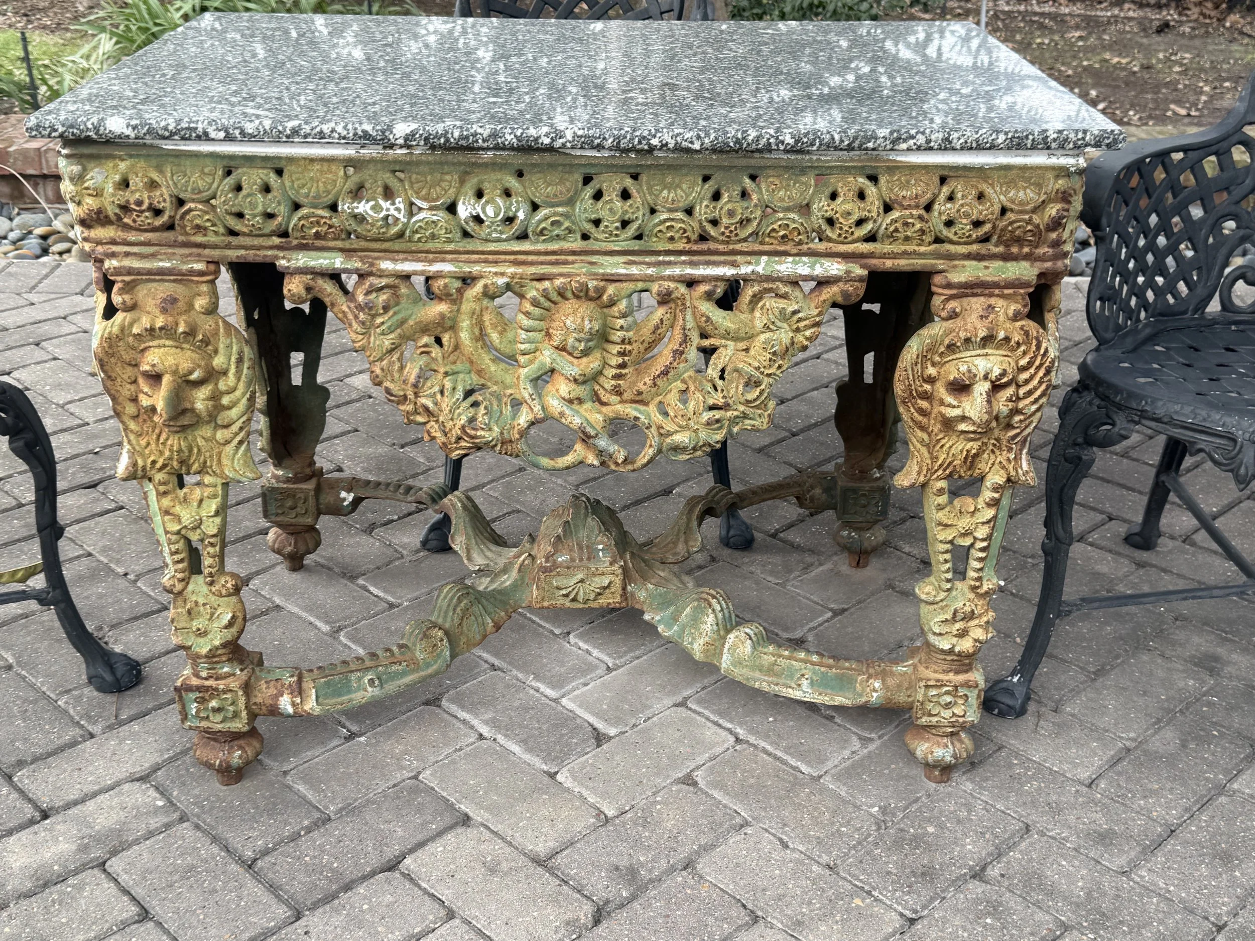 Cast Iron Five-Piece Garden Suite, in the "Four Seasons" Pattern