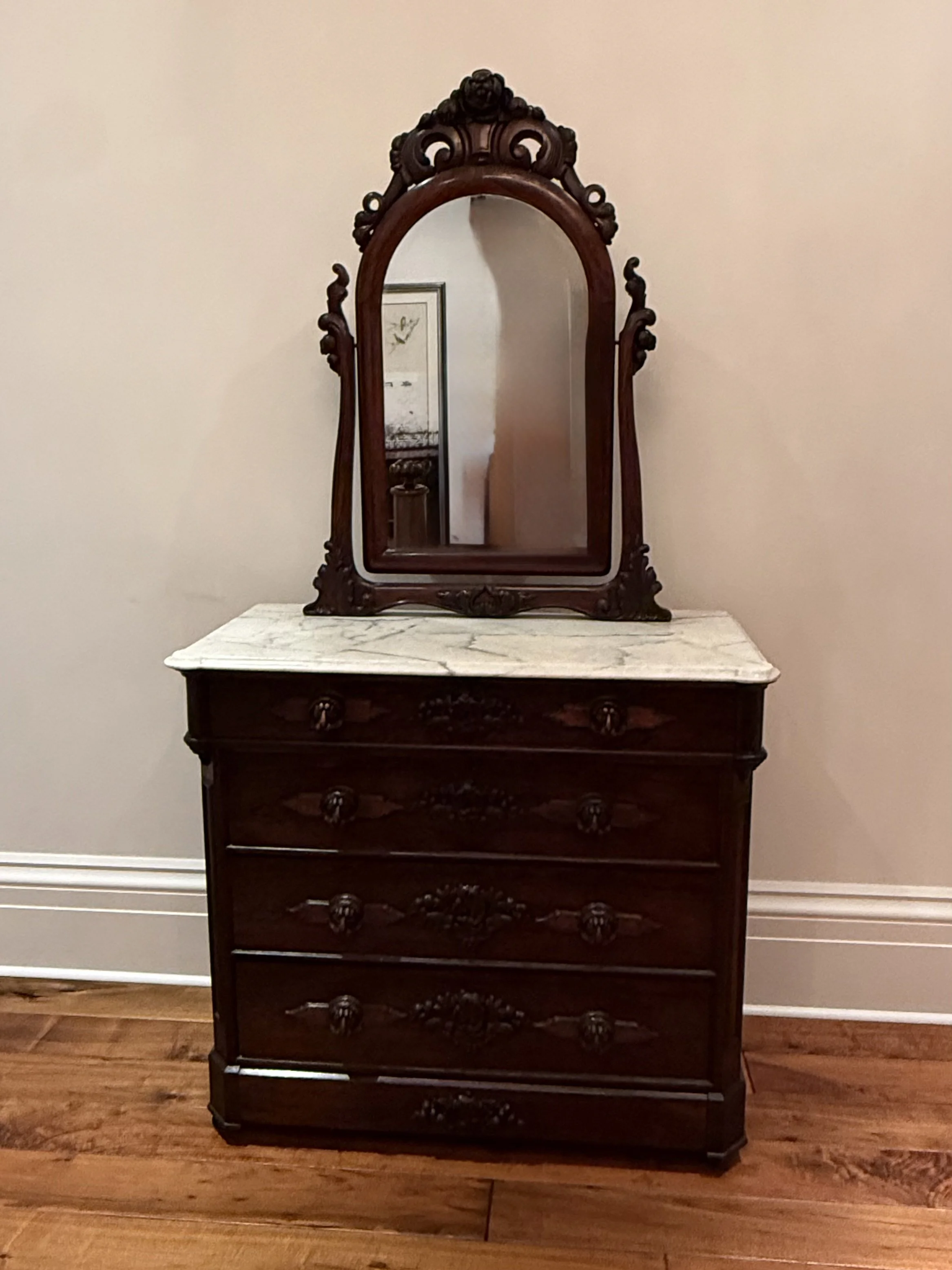 An American Rococo Carved Rosewood Dressing Bureau - John Henry Belter