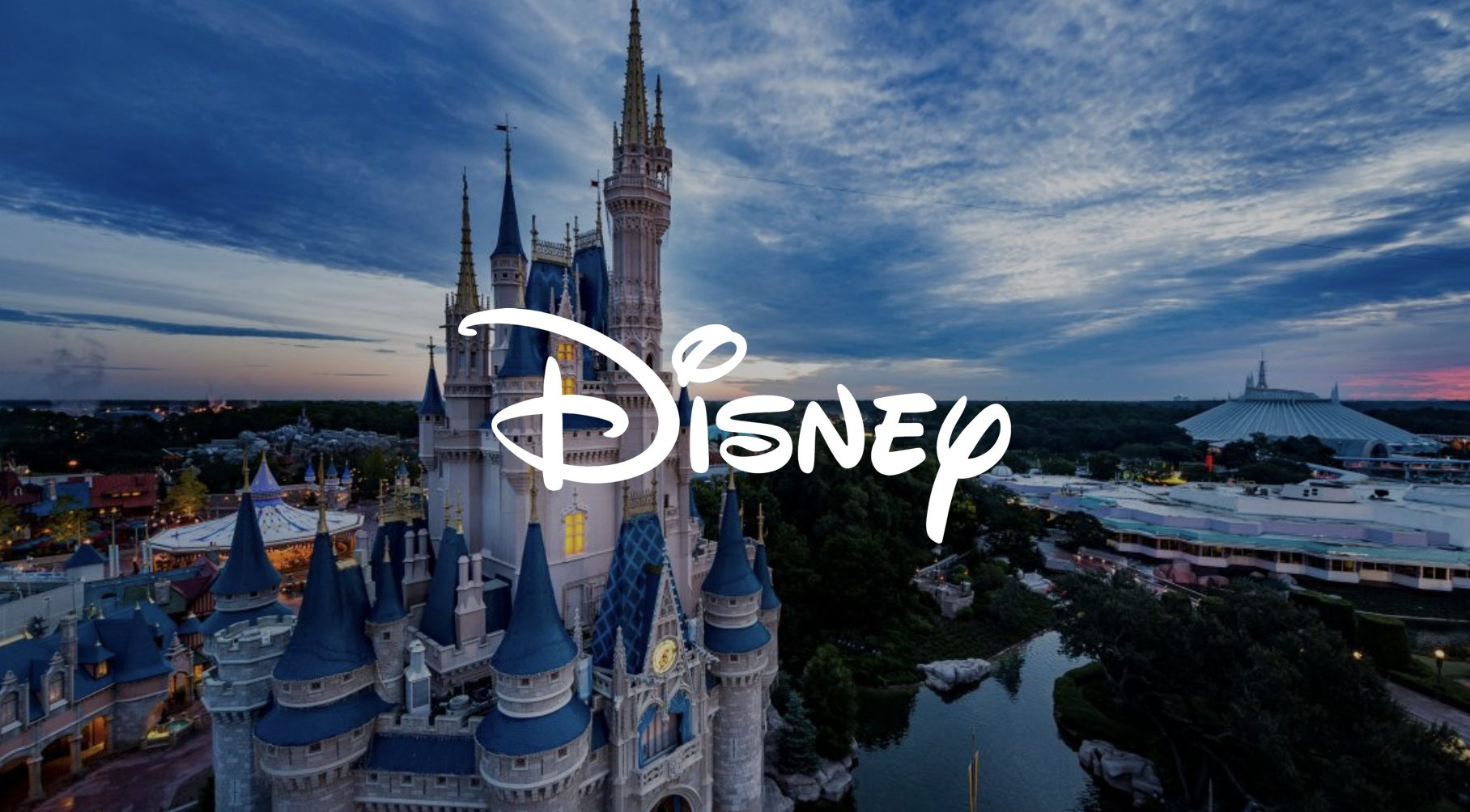 Disney castle during twilight with the Disney logo overlay