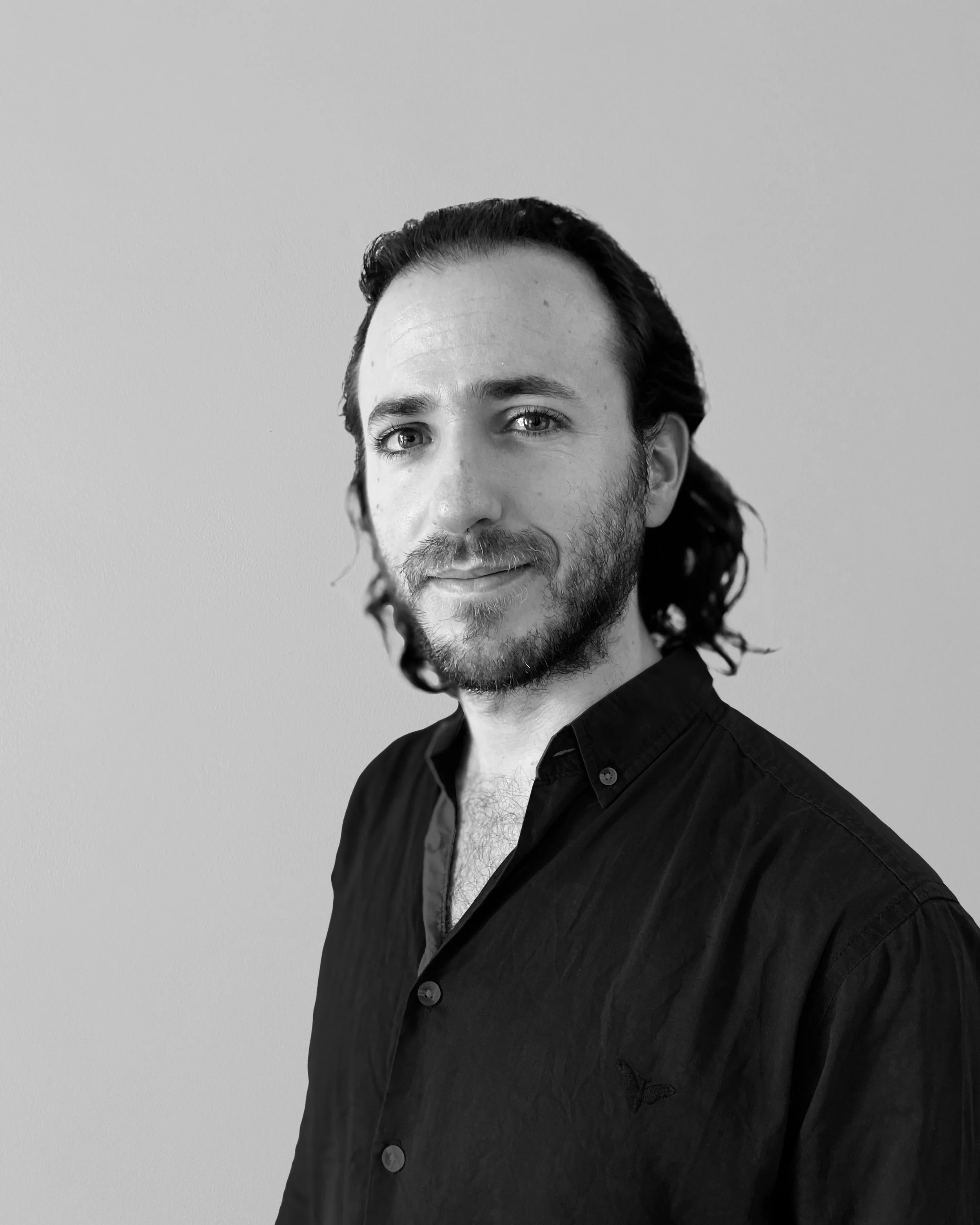 Black and white portrait of Associate Borja Martinez