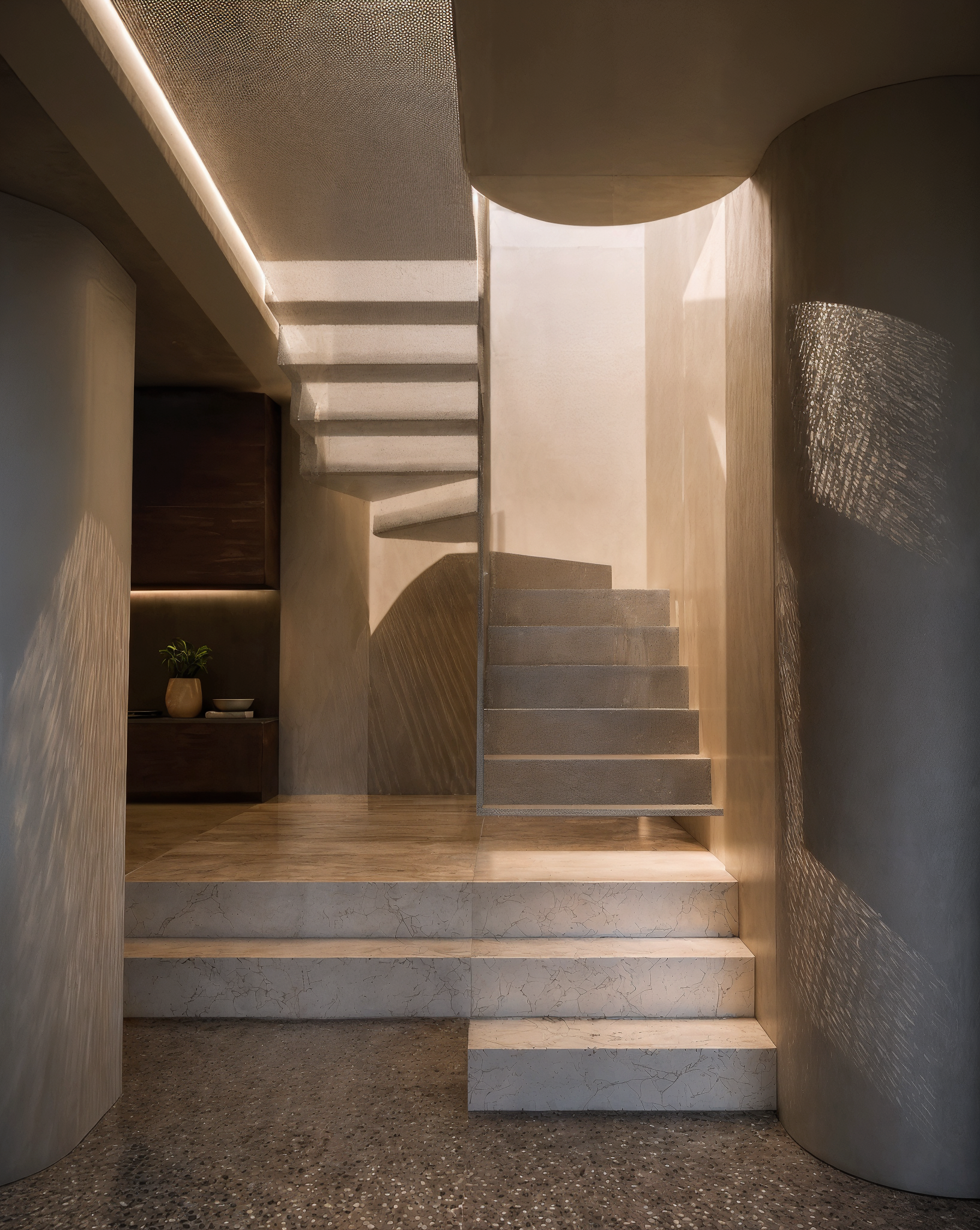Surry Hills terrace renovation stair with curved masonry, integrated lighting and layered thresholds.