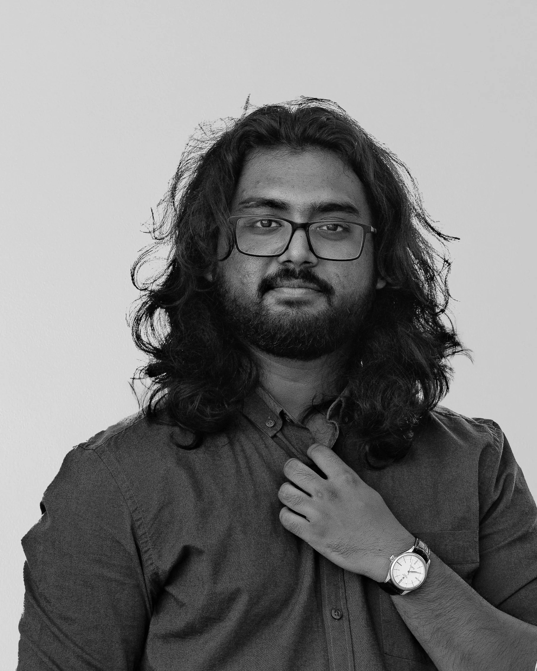Black and white portrait of Associate Adyan Syed