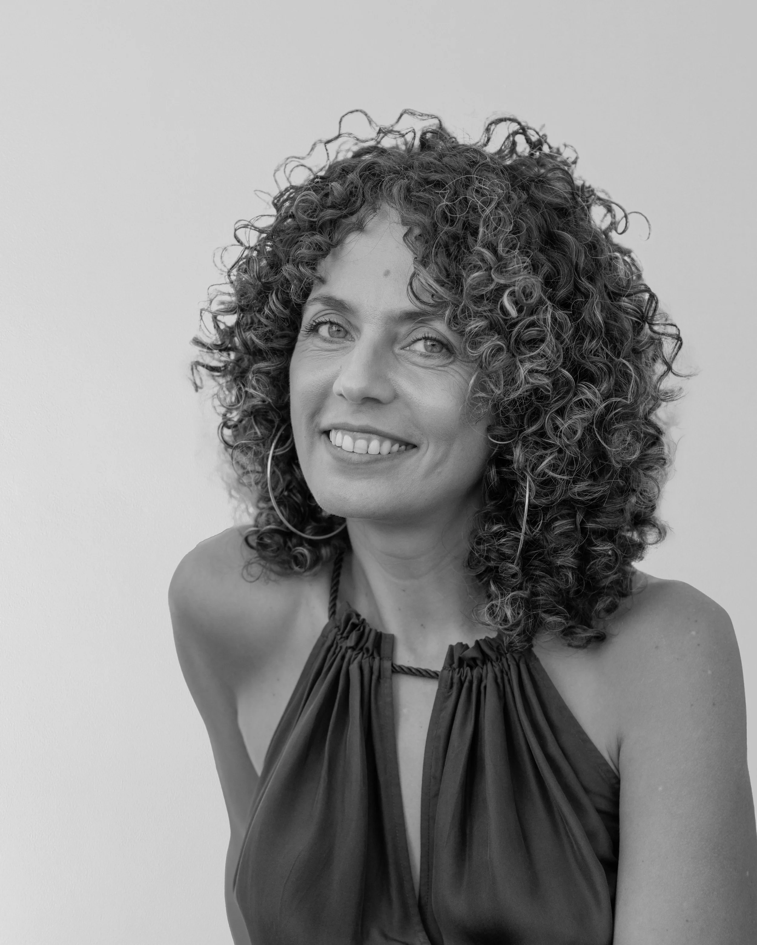 Black and white portrait of Office Manager Amele Medgebeur