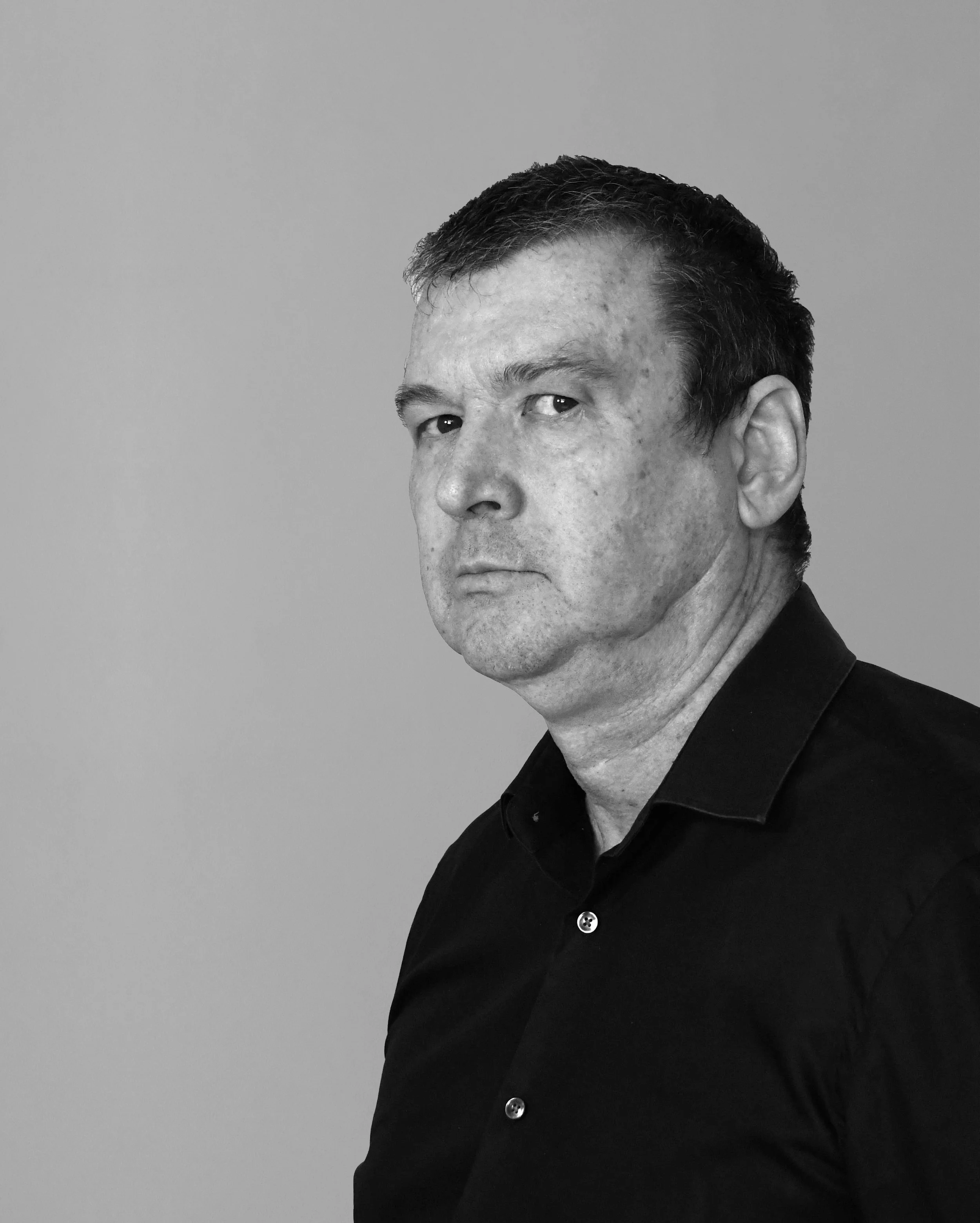 Black and white portrait of Senior Associate Brian Steele