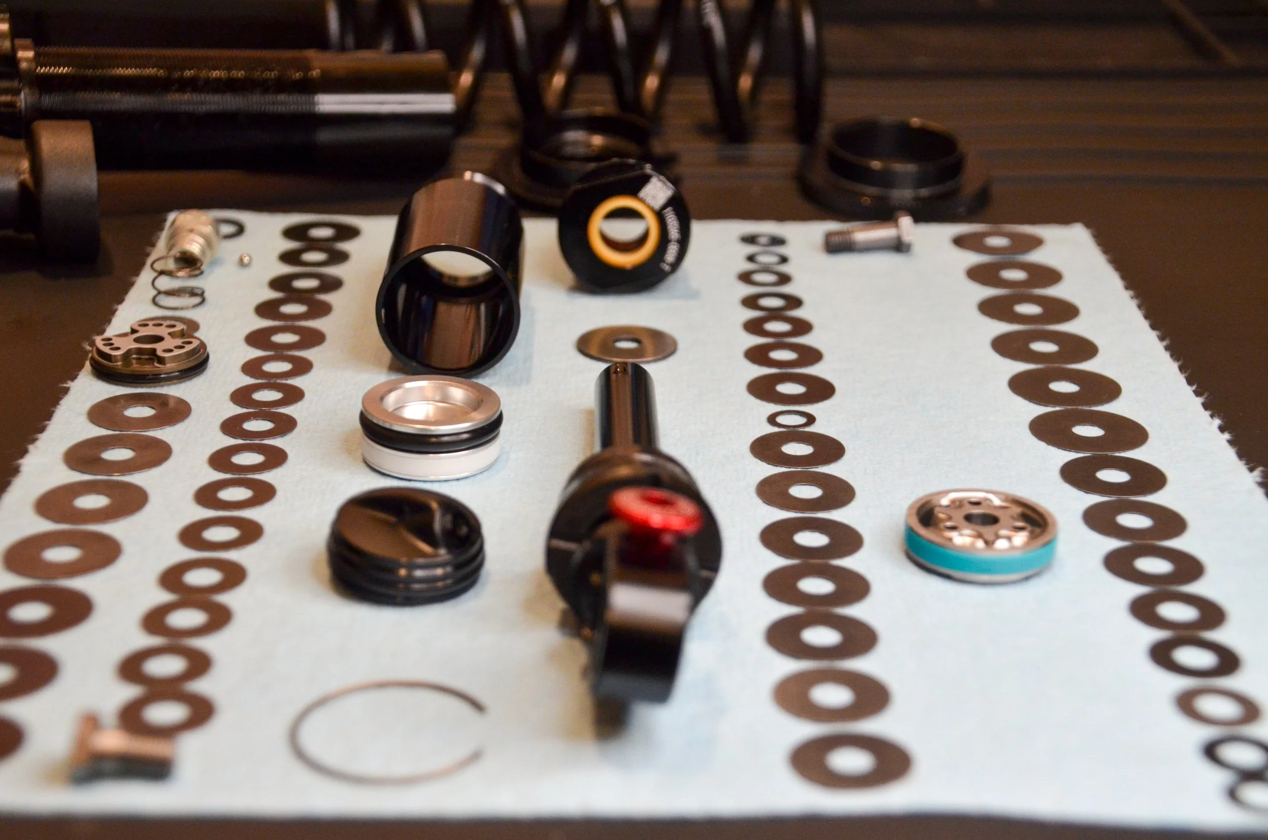 mountain bike coil shock completely diassembled to custom tune and optimize for customer