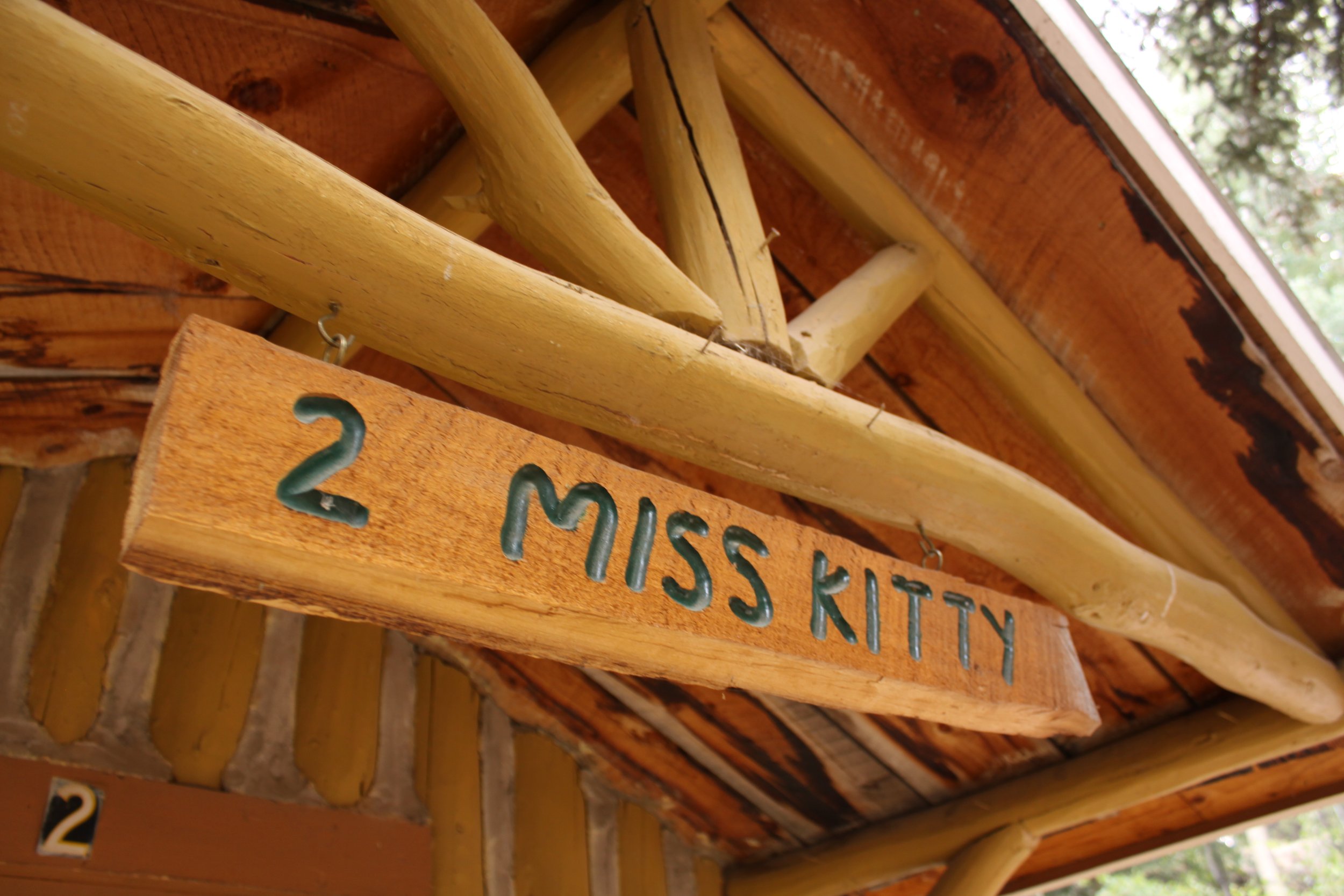 Texan_Resort_Cabin2_Miss_Kitty_1B_Sign.JPG