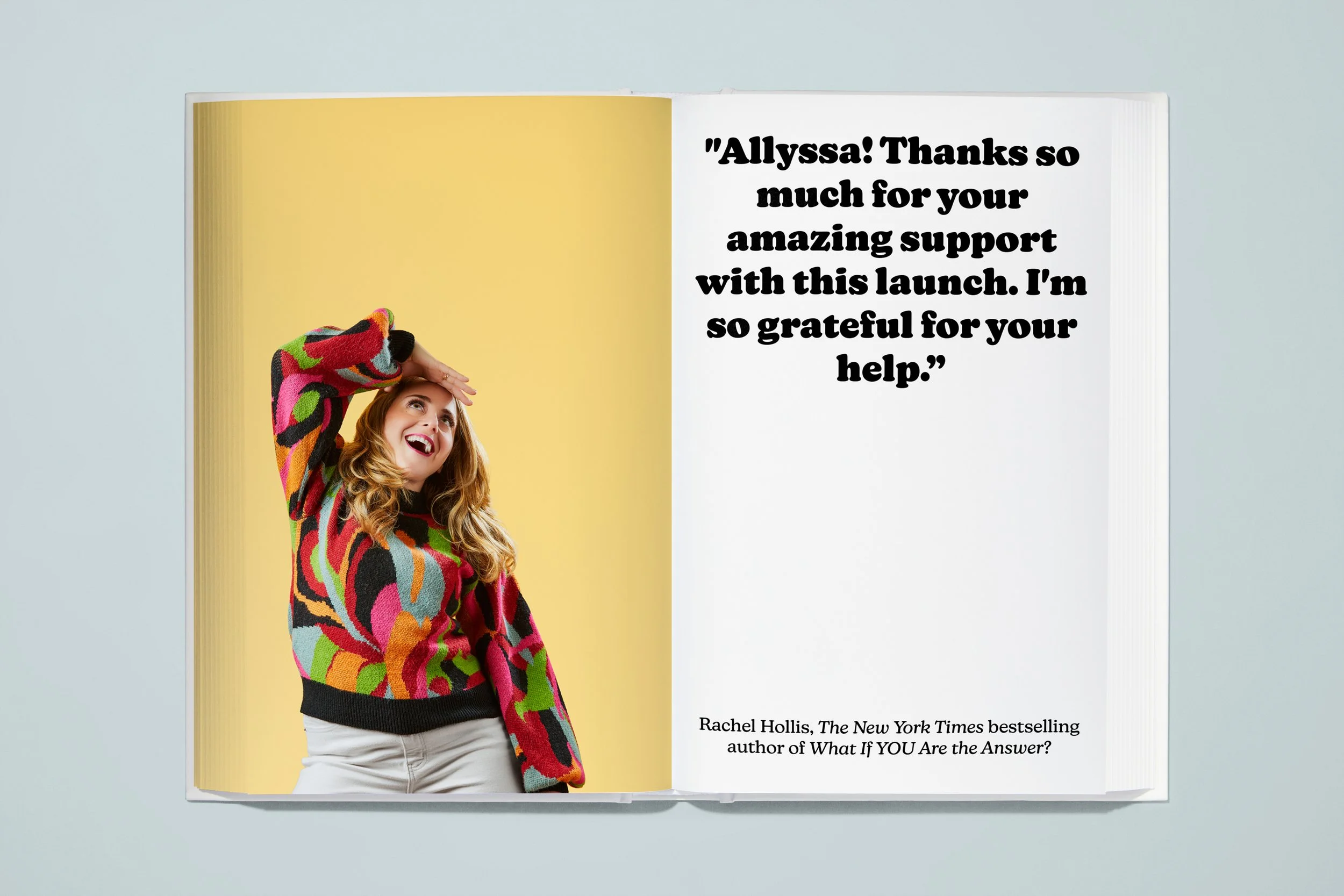 An open book with a picture of a woman wearing a colorful sweater, smiling and looking upward on the left page, and a quote on the right page that reads, "Allyssa! Thanks so much for your amazing support with this launch. I'm so grateful for your hel