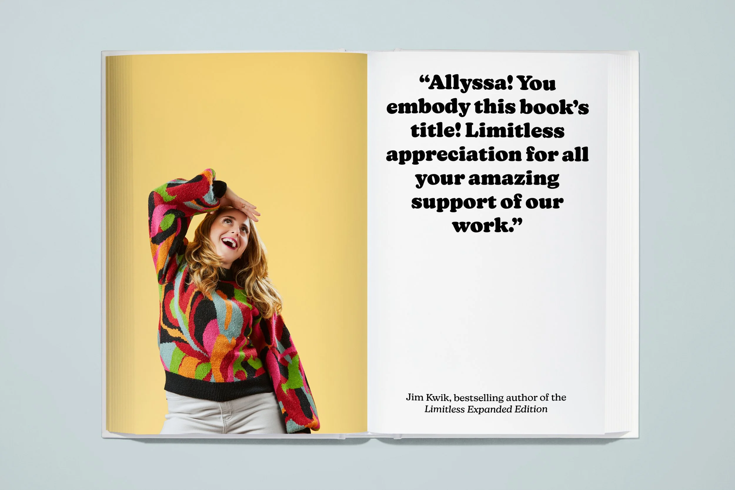 Open book with a picture of a woman wearing a colorful patterned sweater, smiling and looking upward, on the left page. The right page contains a quote in bold text praising Allyssa, attributed to Jim Kwik, author of the Limitless Expanded Edition.