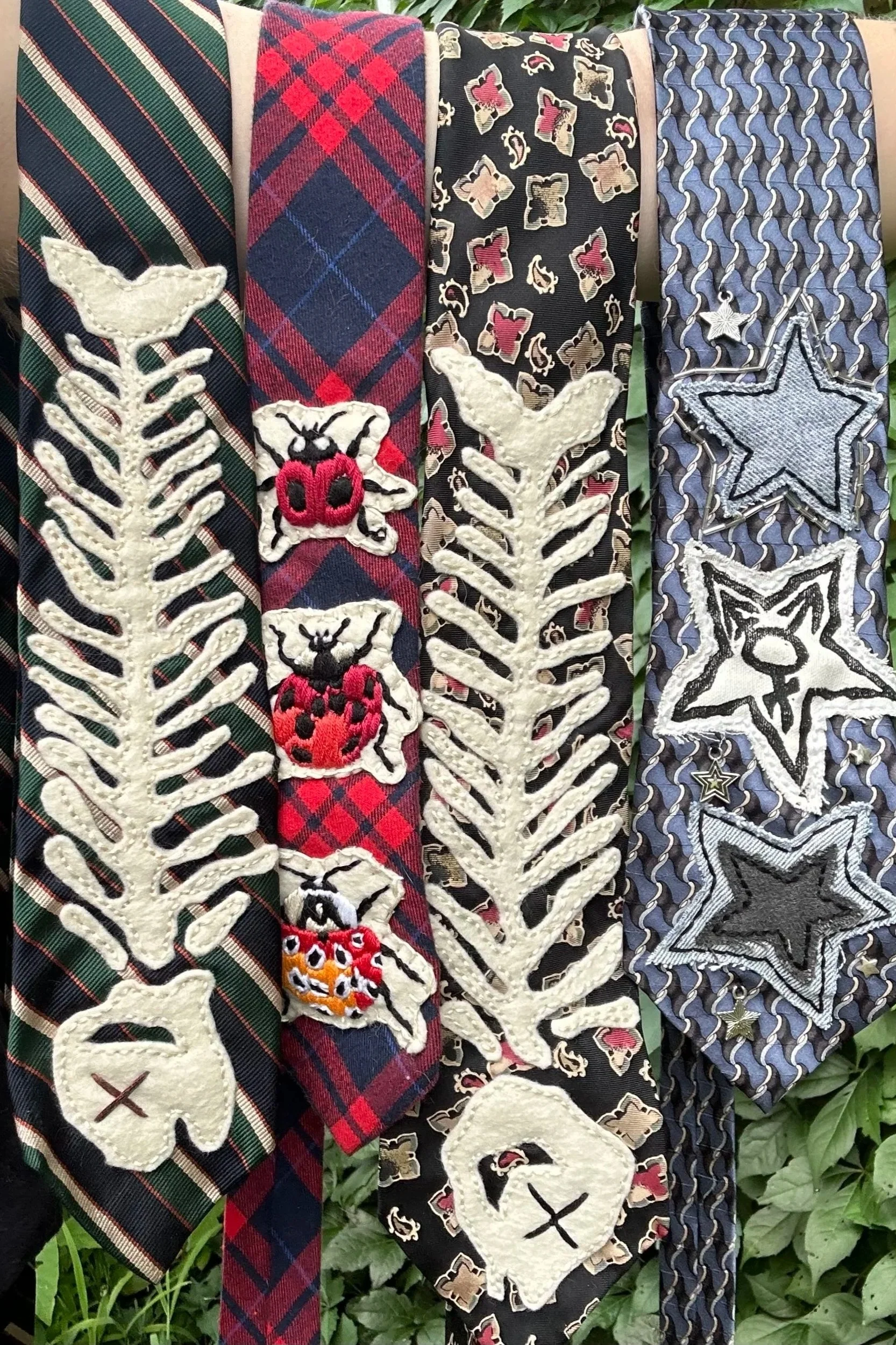 Hand-embroidered upcycled neckties, 2025