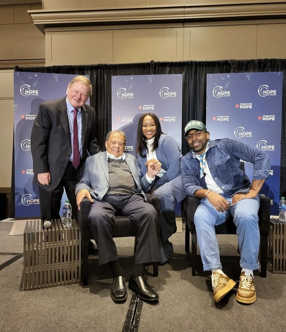 Neneh and other speakers pose for a photo at the Global Hope Forum