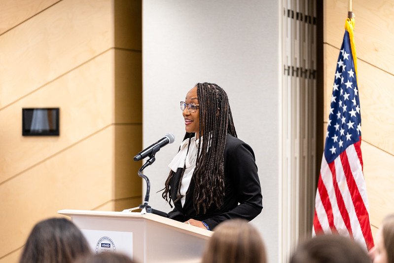 Neneh speaking at USAID Town Hall