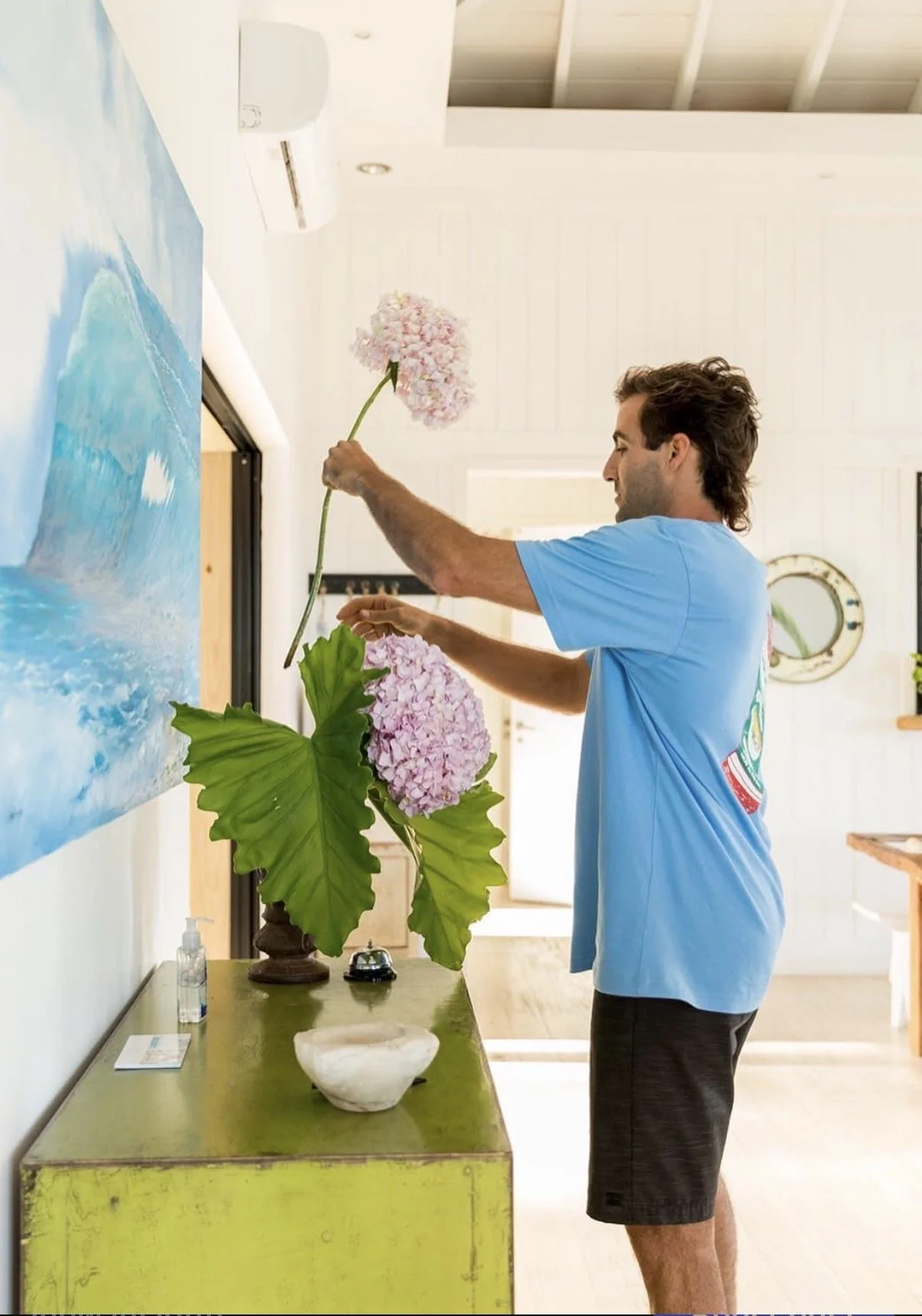 Juan Manuel with flowers in Casa Flor