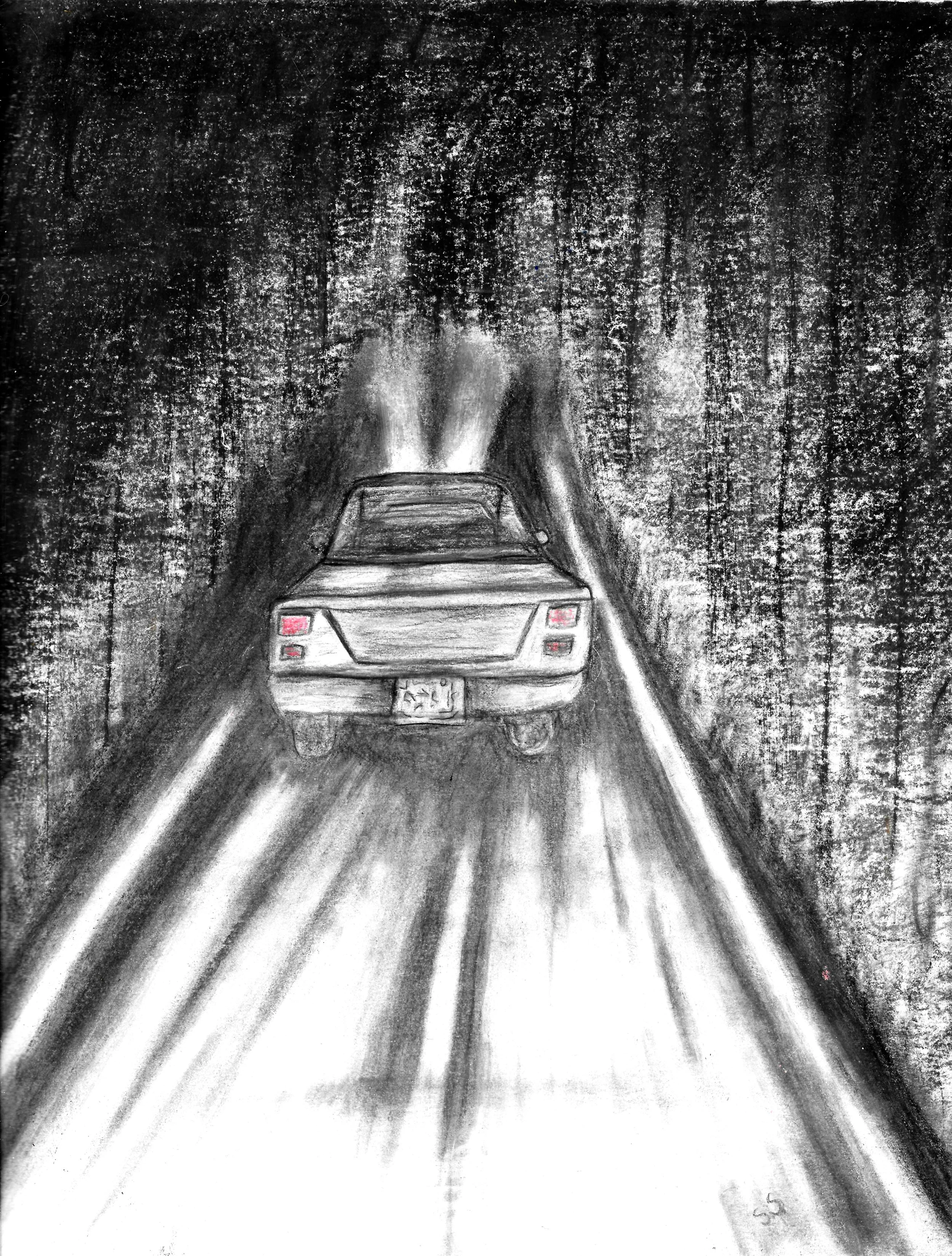 A picture of a car in what appears to be a dark forest at night