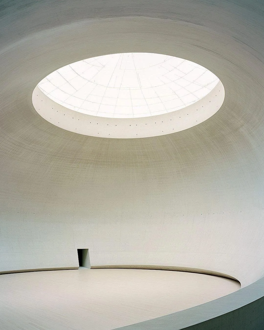 Quiet interior space arranged for a thoughtfully curated group experience.