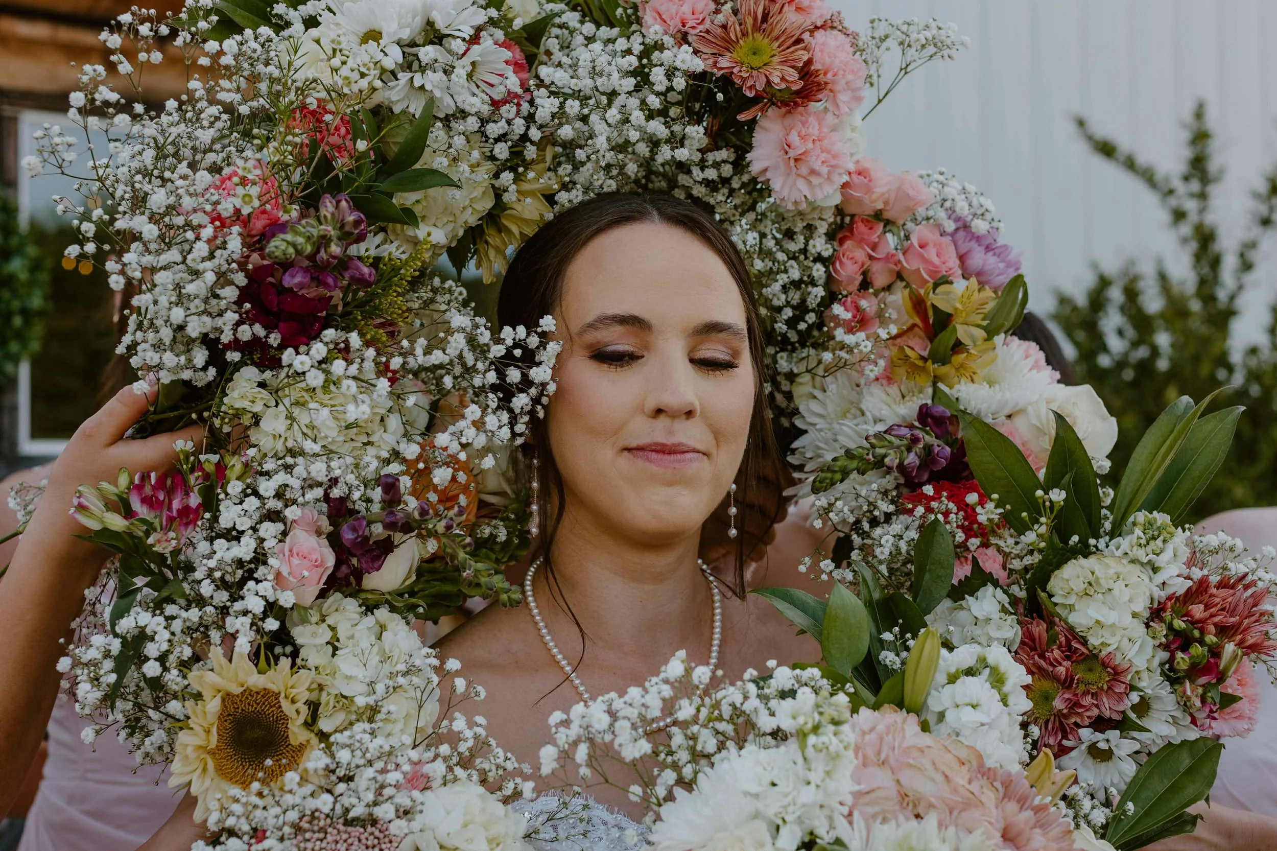Bride hairstyle updo and makeup by Monica Machuca North Carolina