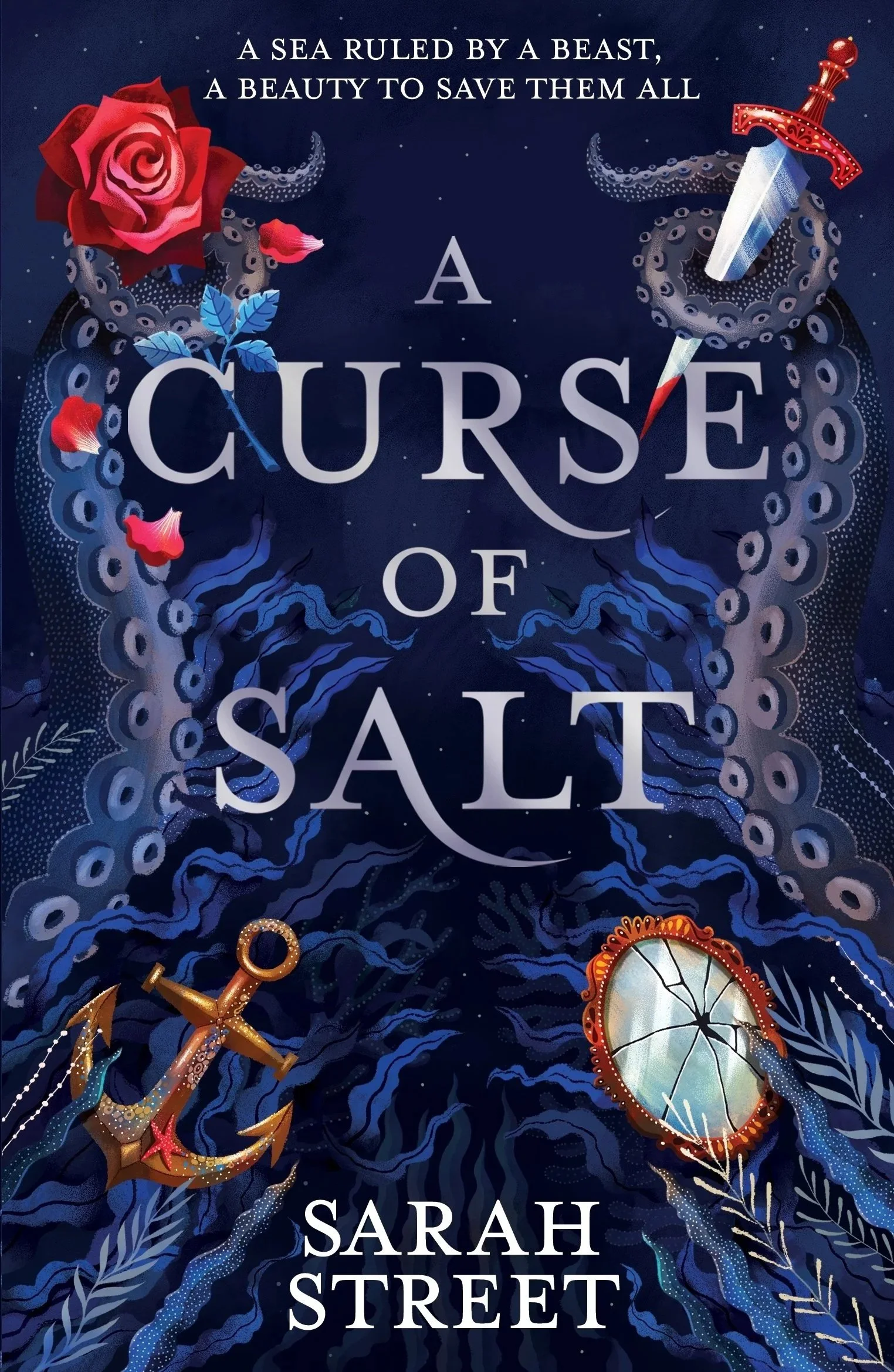 The book cover of 'A Curse of Salt', with a dark blue background, a large red rose and flower petals, a dagger with a red handle, an anchor, a broken mirror, and the tagline 'A sea ruled by a beast, a beauty to save them all.'