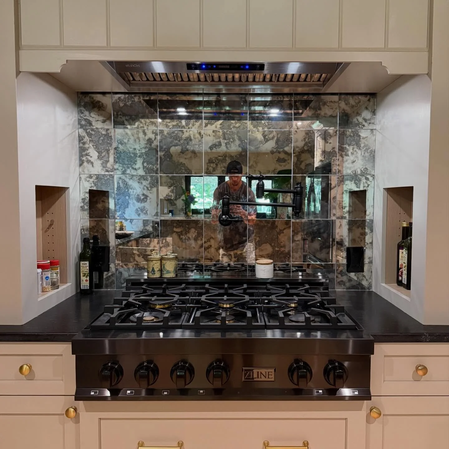Glass backsplash are getting a lot of hype right now.. also pot fillers are a must for your kitchen reno super very convenient to fill up right at the stove. Which do you prefer tile or glass?