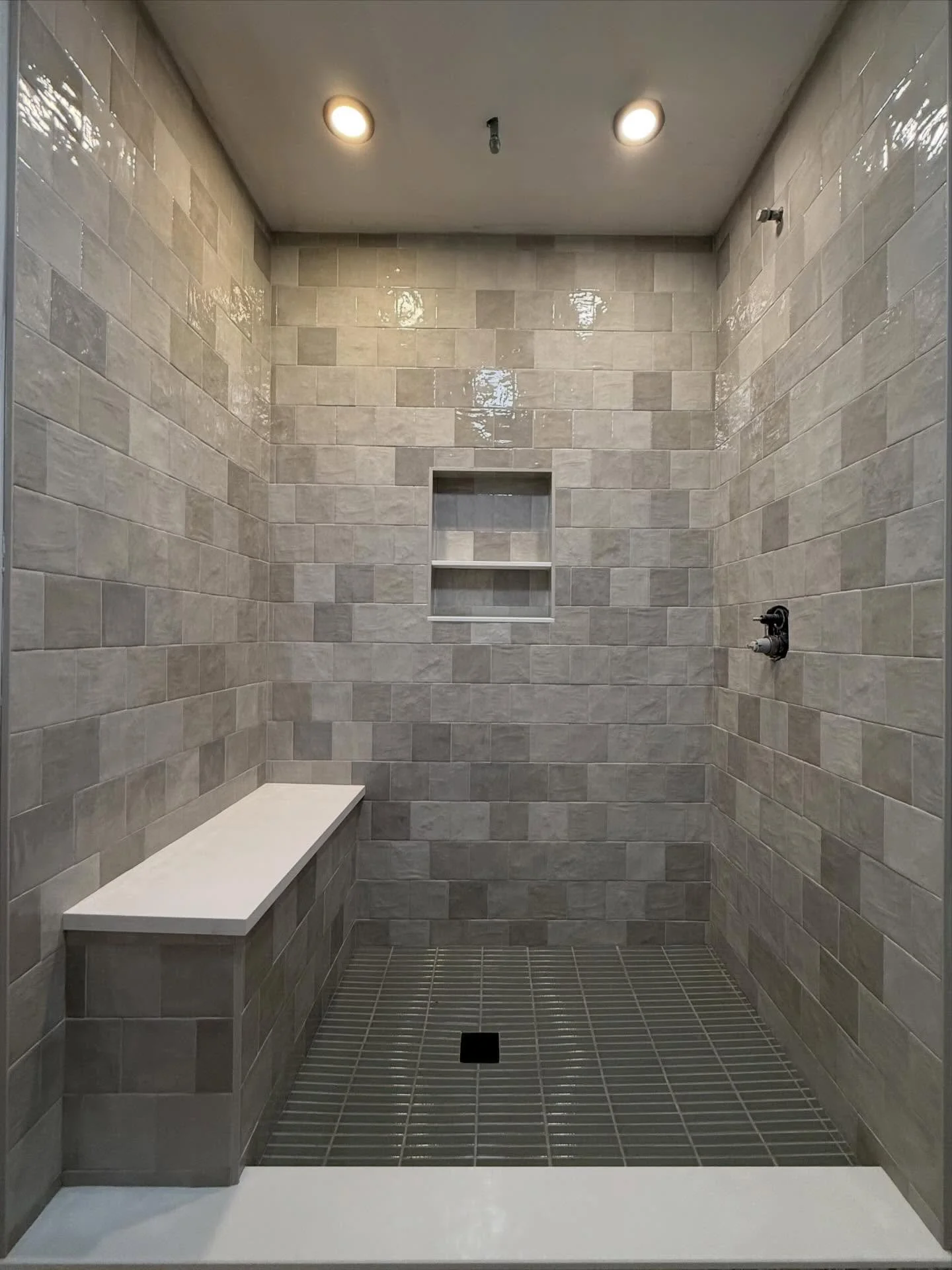 Before/ after of a tub turned shower. We added a couple lights along with a waterfall showerhead coming through the ceiling for the ultimate shower experience. Message me today for a free quote or call 843-872-7518