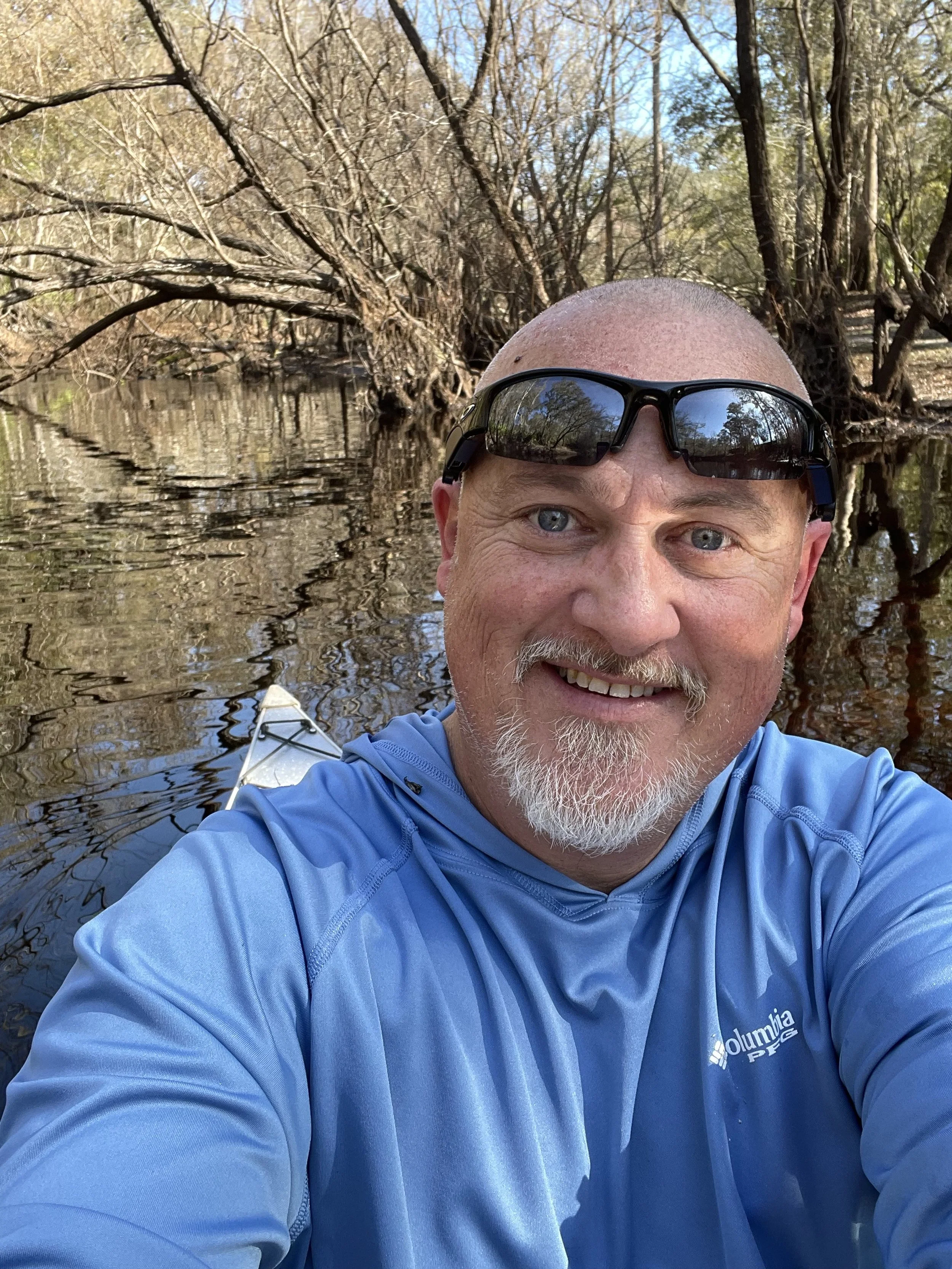 Jay in a kayak on the upper Santa Fe River