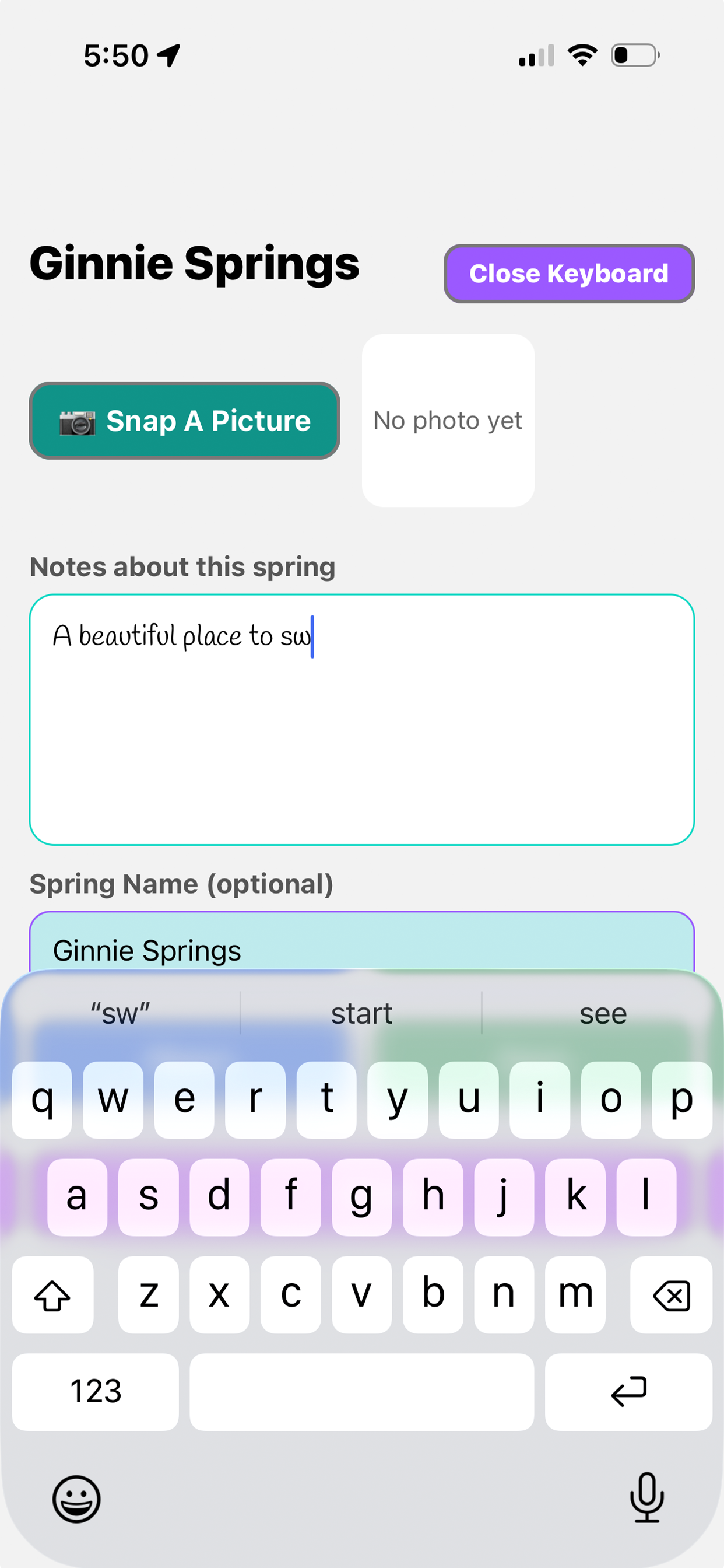 Mobile app screen for Ginnie Springs with options to take a photo, add notes about the spring, and input an optional spring name, with keyboard open and text partially typed in the spring name field.
