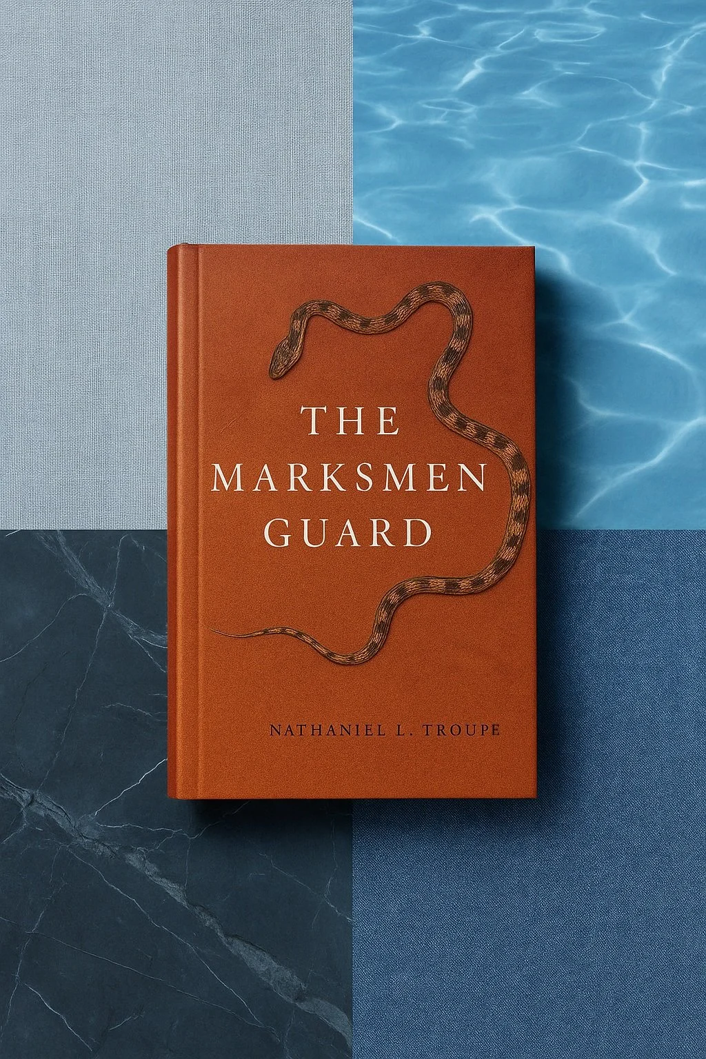 Book titled 'The Marksmen Guard' by Nathaniel L. Troupe, placed on a surface with sections of light blue fabric, dark marble, and blue water patterns.
