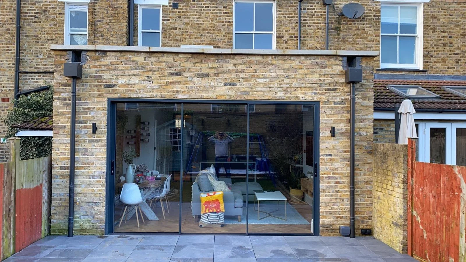 Single storey ground floor, and mansard roof extensions to property in South-West London