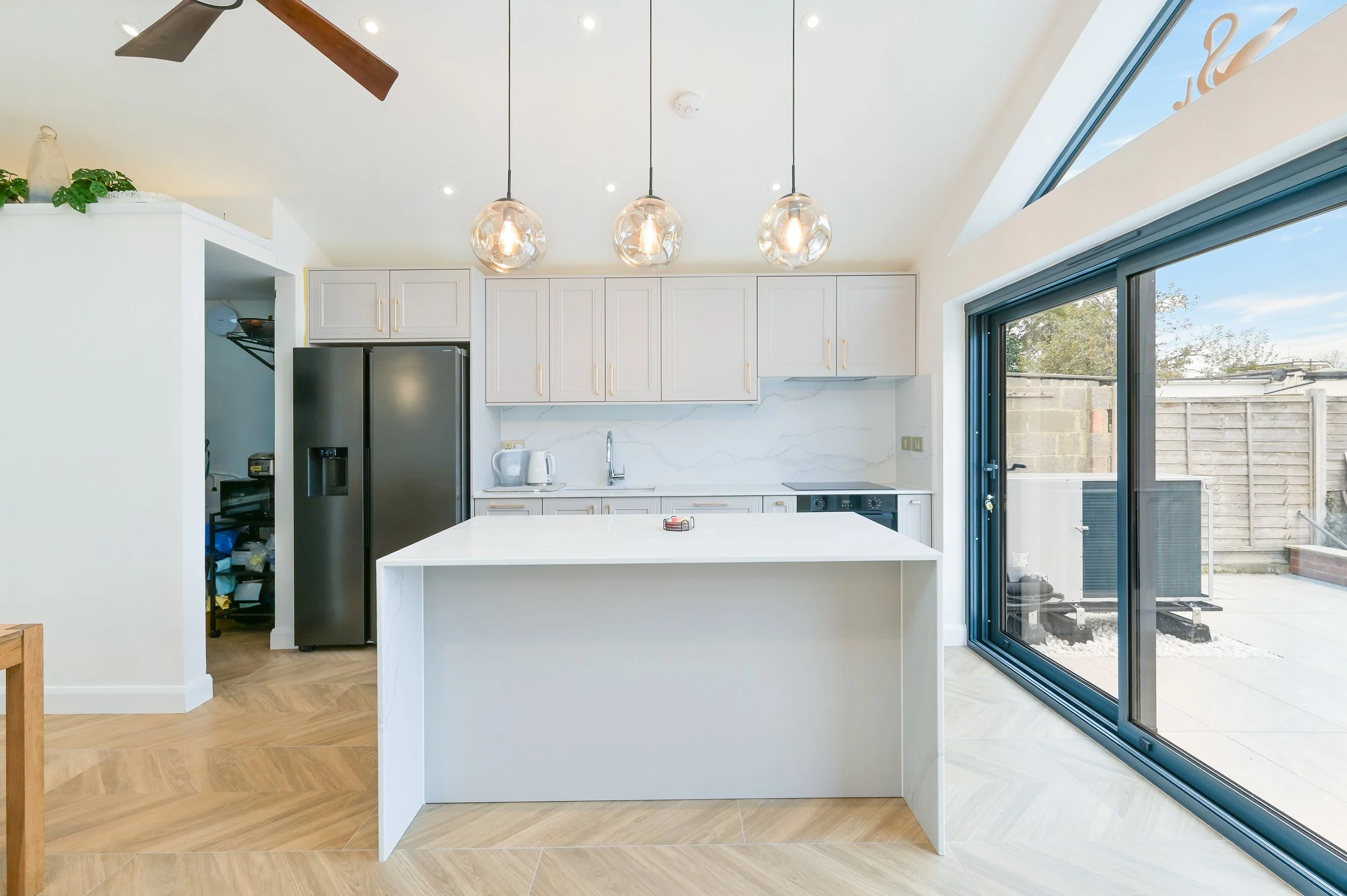 Single storey rear and front porch extensions to semi-detached house in West London