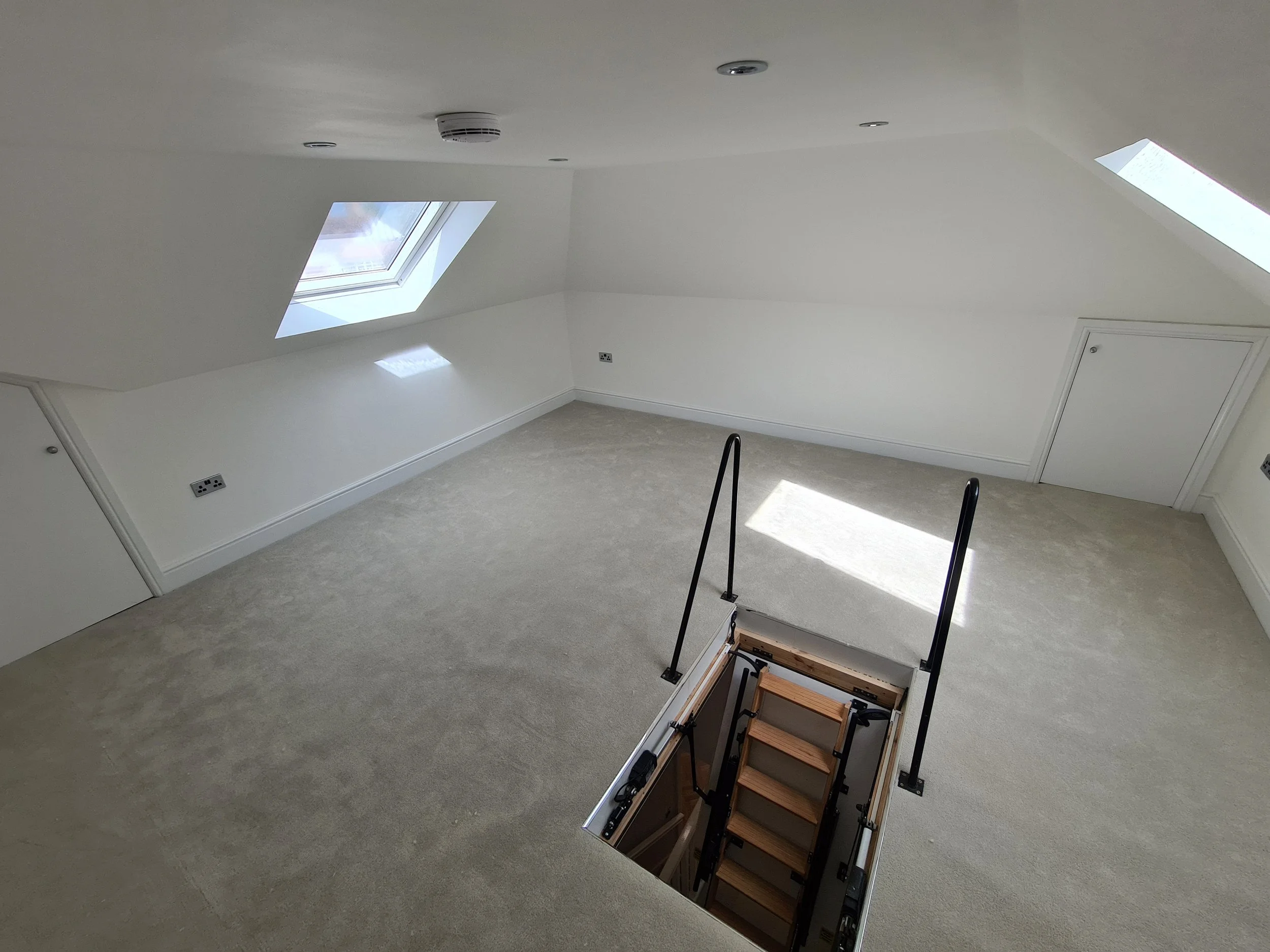 Single storey rear extension and garage conversion to semi-detached house in Surrey