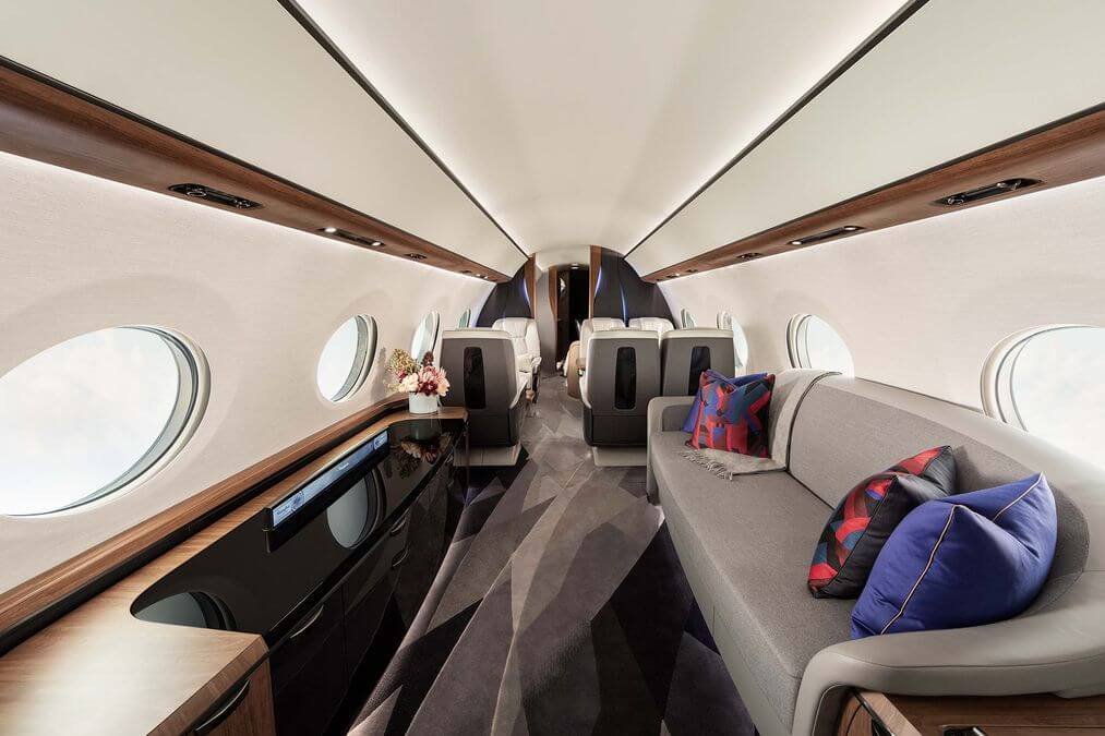 Luxurious interior of a private jet with plush seating and stylish decor