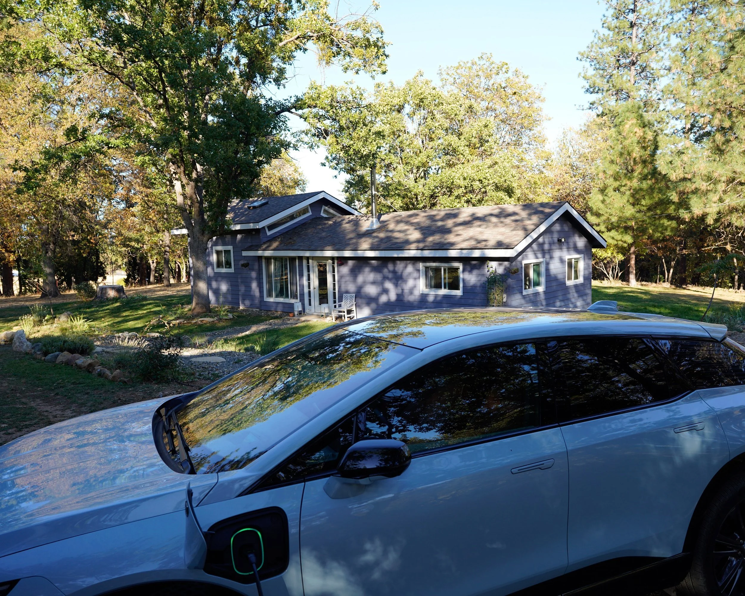 An electric car charging outside Blossom Sanctuary in Etna, California, an overnight stop on the I-5 drive between Ashland and Sacramento