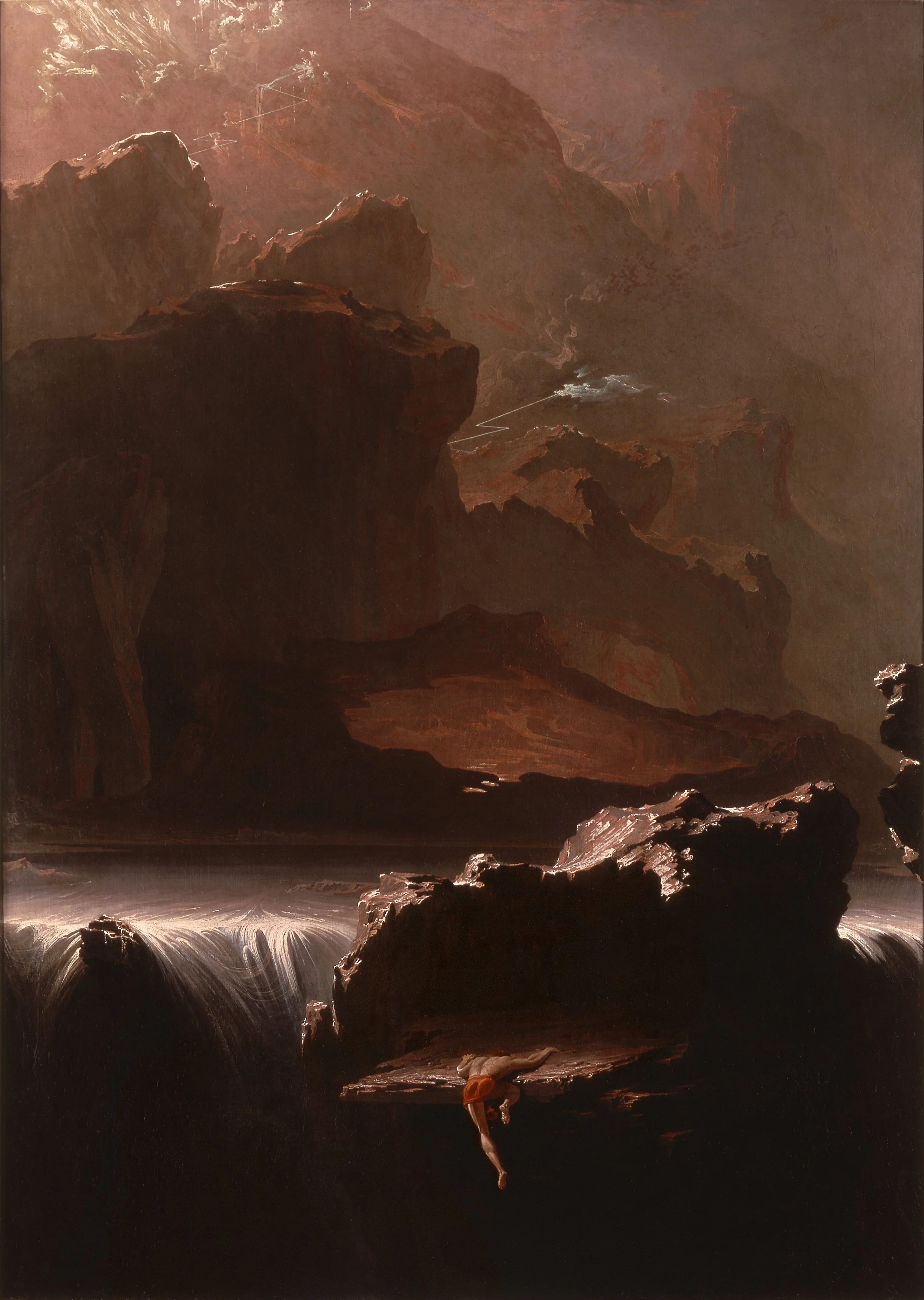 Sadak in Search of the Waters of Oblivion by John Martin 1812 oil on canvas. Dark rocky canyon with a waterfall and a person hanging from a ledge.