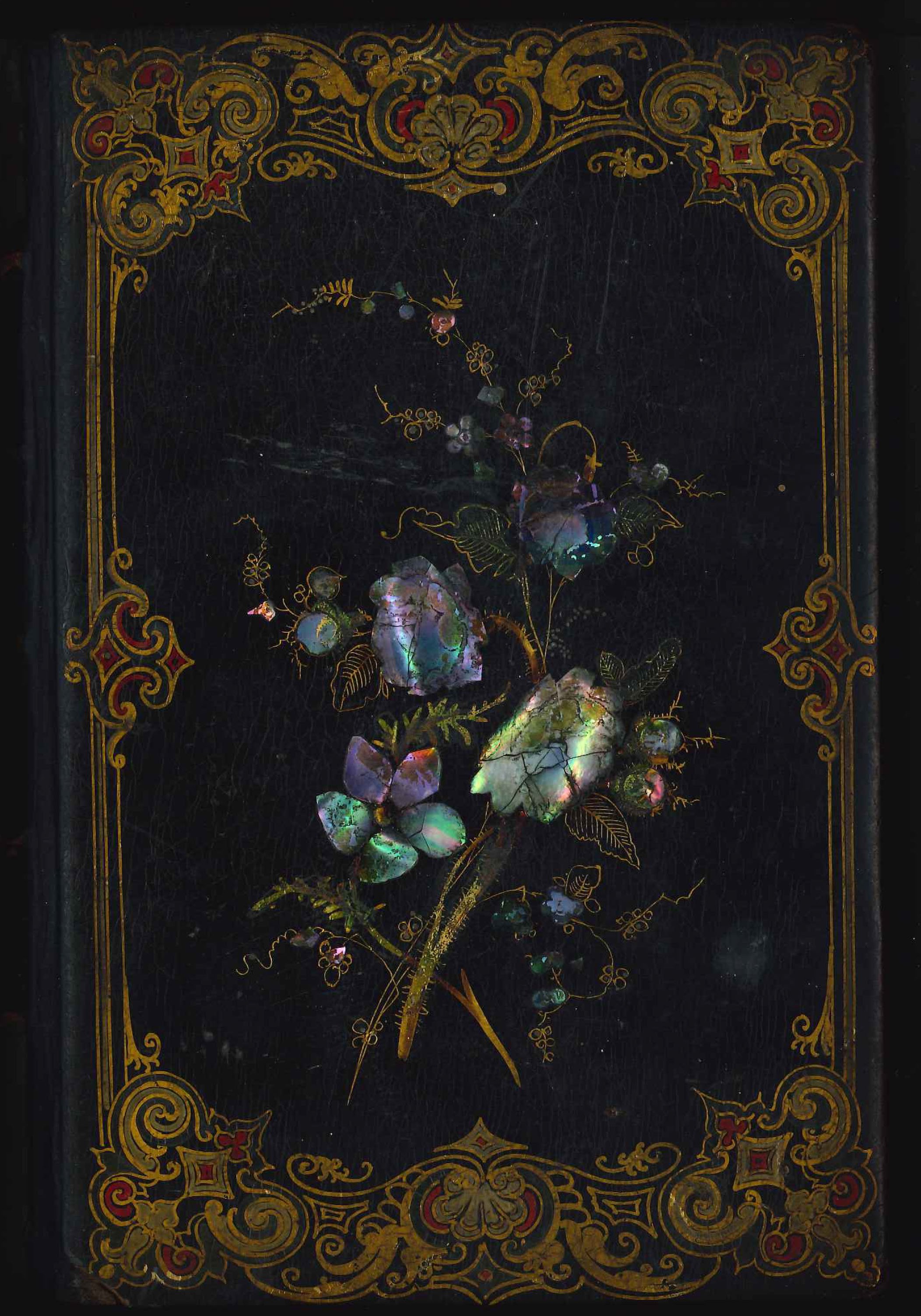 Photo by the Library Company Conservation Dept. - Artist Unknown 1850-1855. Paper mache or Papier-mâché. An ornate book cover made of iridescent mother-of-pearl elements on a black background.