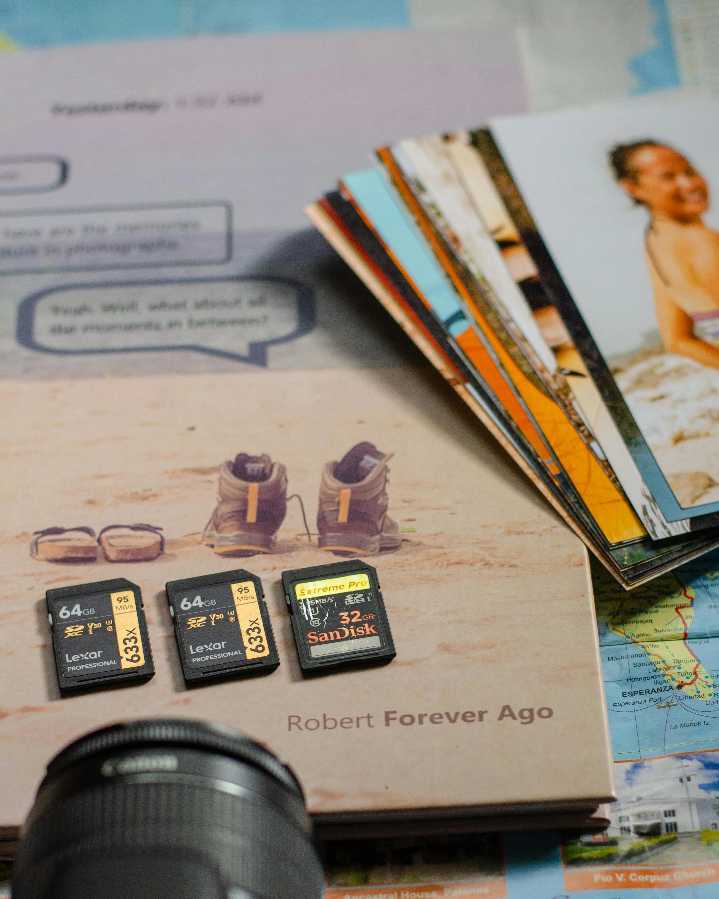 Photo book with camera and multiple memory cards which should be digitized for future safekeeping