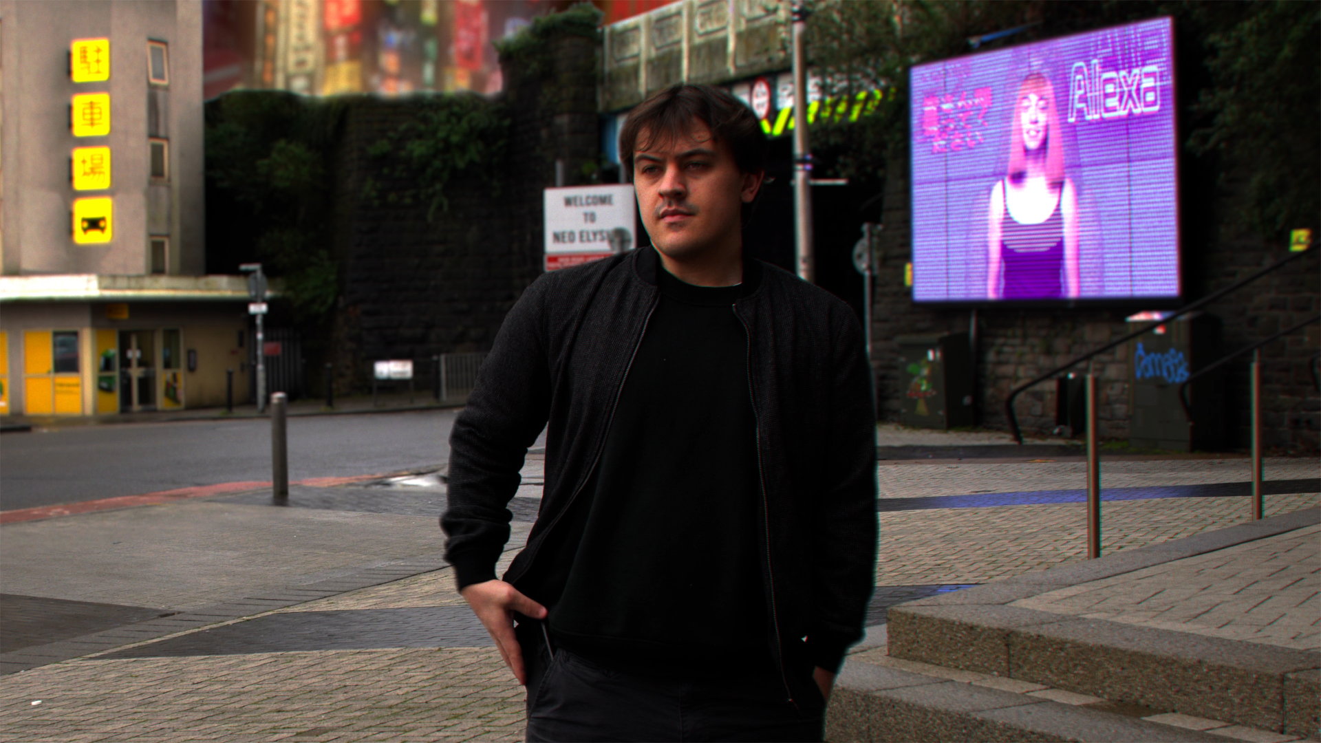A young man with brown hair and light skin, wearing a black jacket and black shirt, stands on a sidewalk at a city street corner, with his hands in his pockets, looking to the side. Behind him are buildings, a digital billboard displaying a woman with the name 'Alexa,' and various signs.