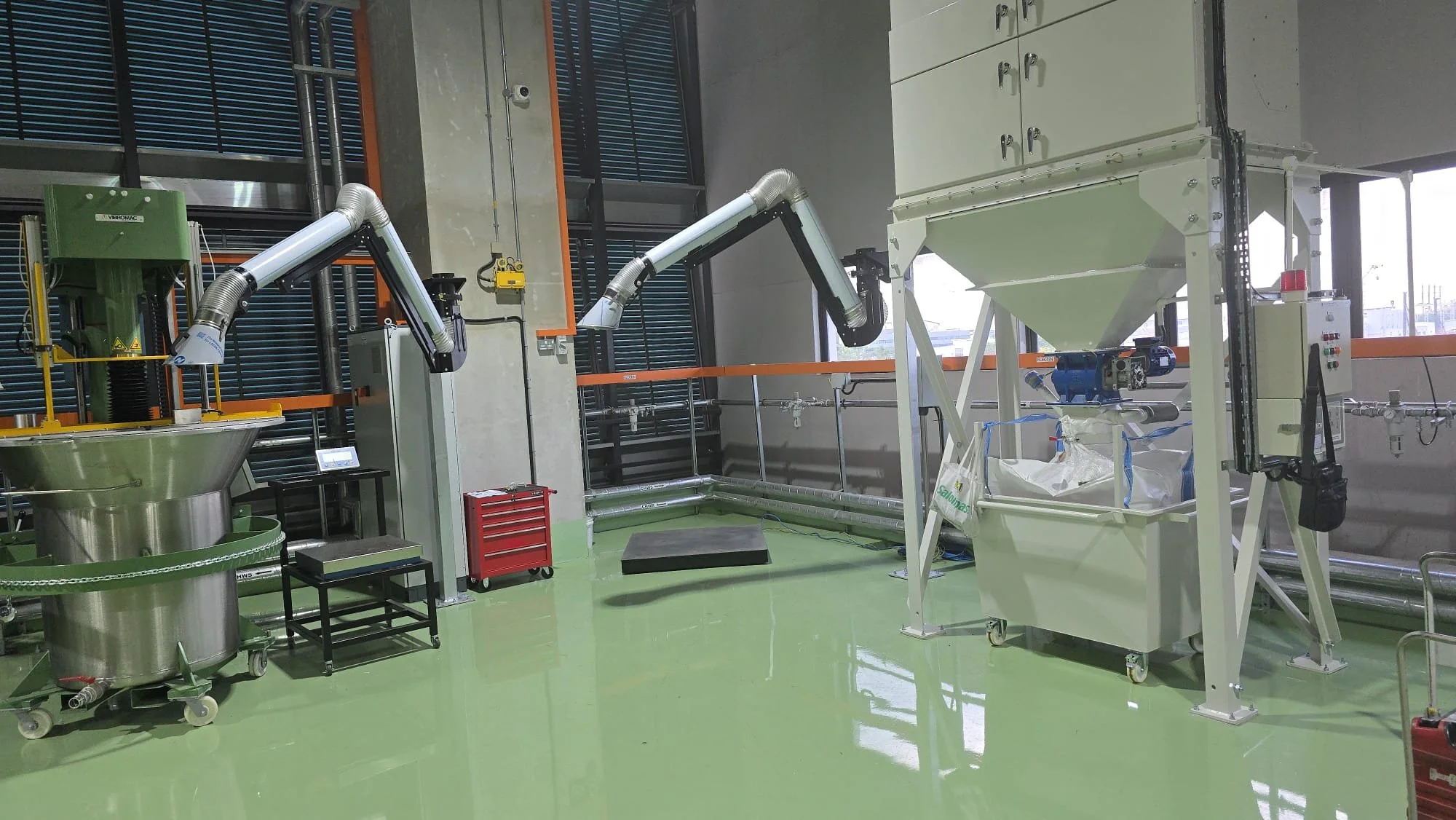 Articulated extraction arm capturing welding fume directly at source