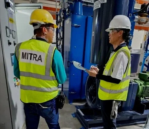 Mitra service technician carrying out inspection