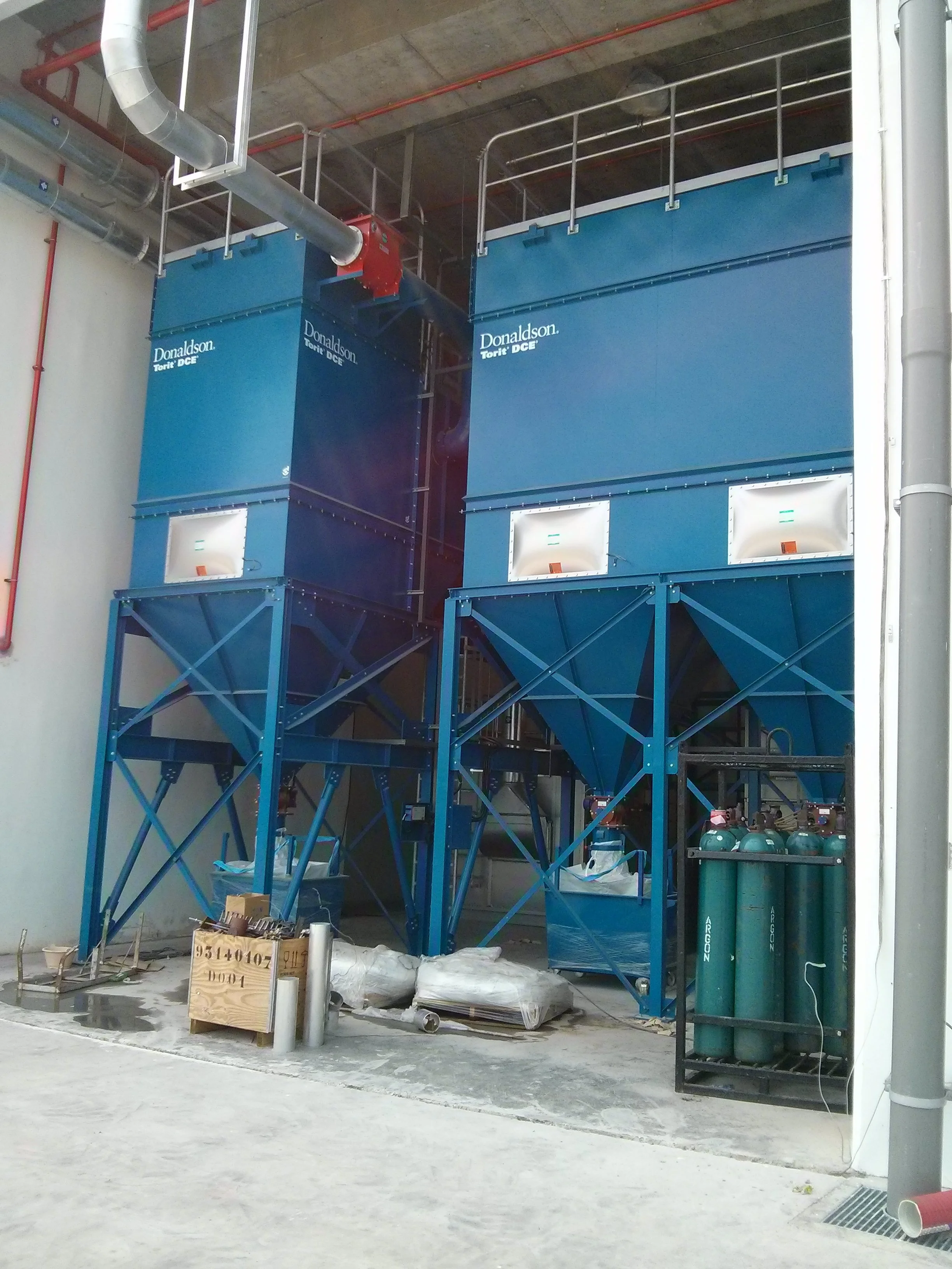 Explosion venting panel fitted to the side of an industrial dust collector