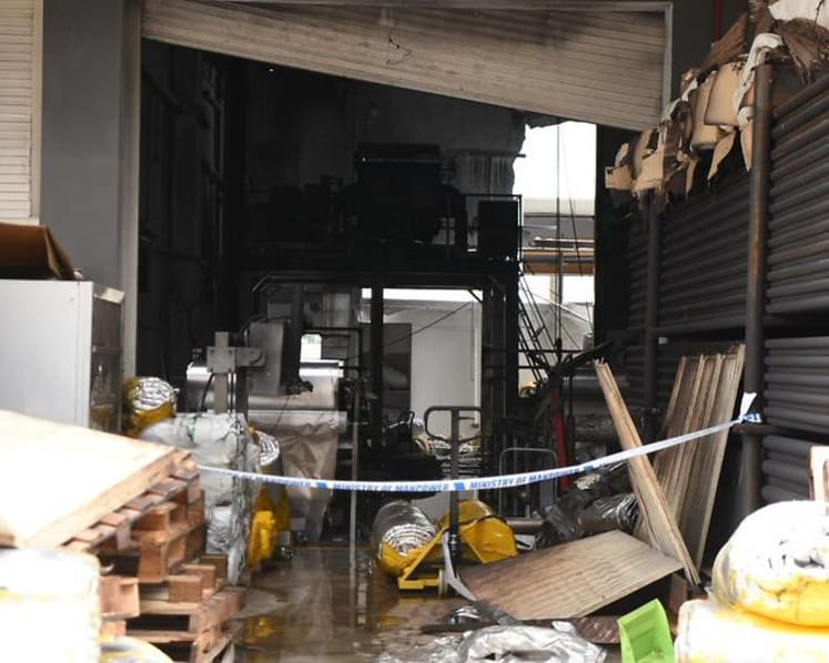 Aftermath of the Tuas industrial explosion, illustrating combustible dust risk