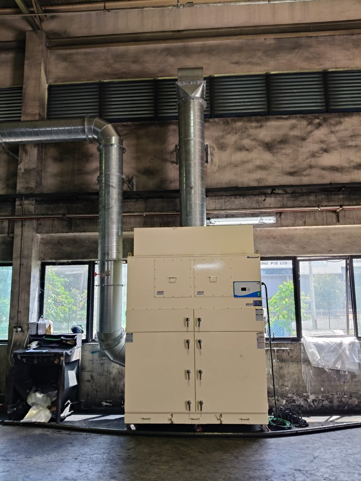 Centralised fume extraction system serving multiple points