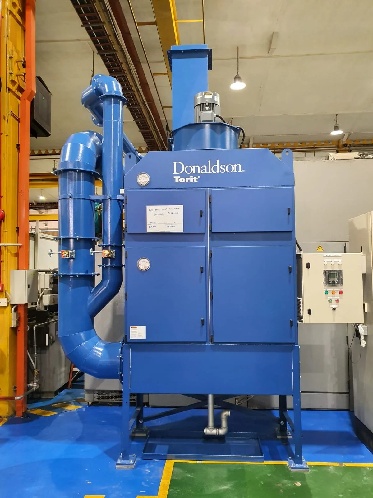 Oil mist collector installed in a Singapore machining workshop