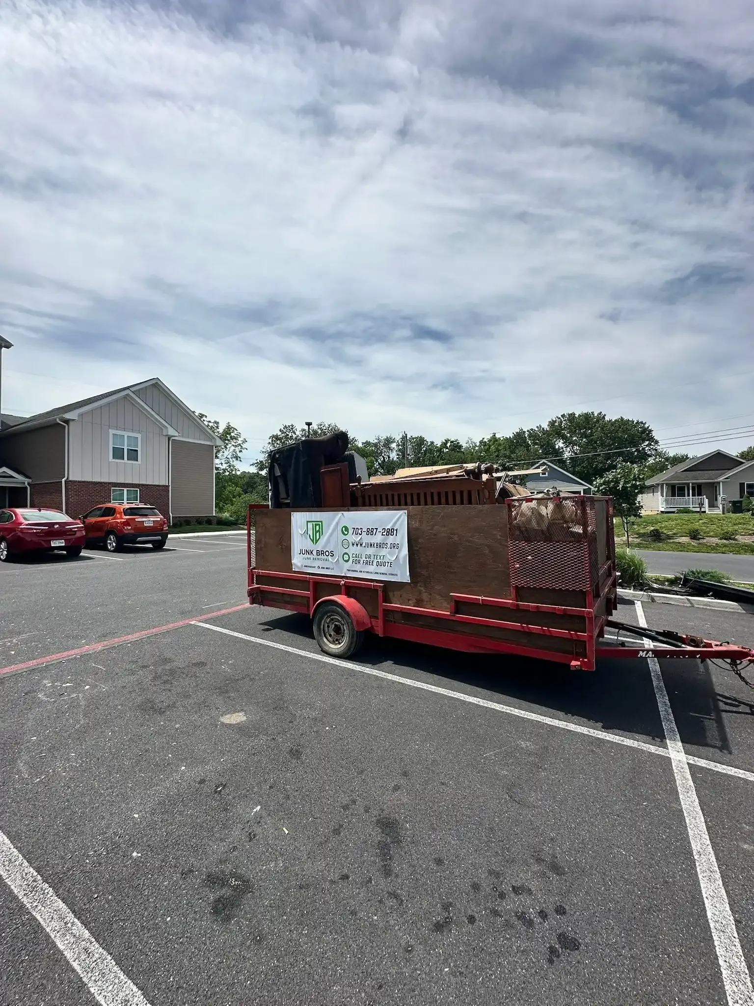 Junk Bros trailer loaded with unwanted items during a junk removal job in Prince William County, Virginia