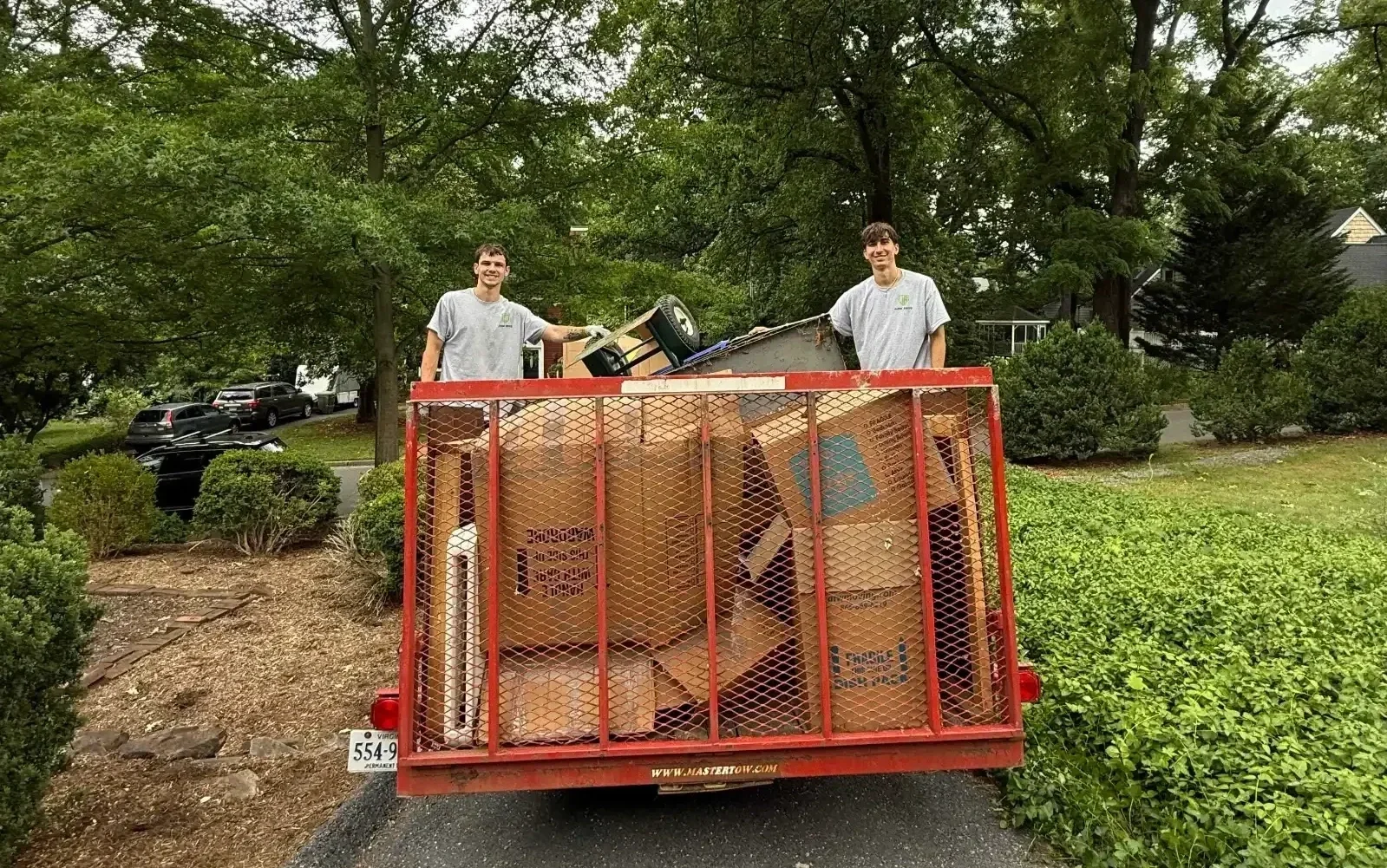 Junk Bros crew with a loaded trailer after a residential junk removal job in Augusta County, Virginia.