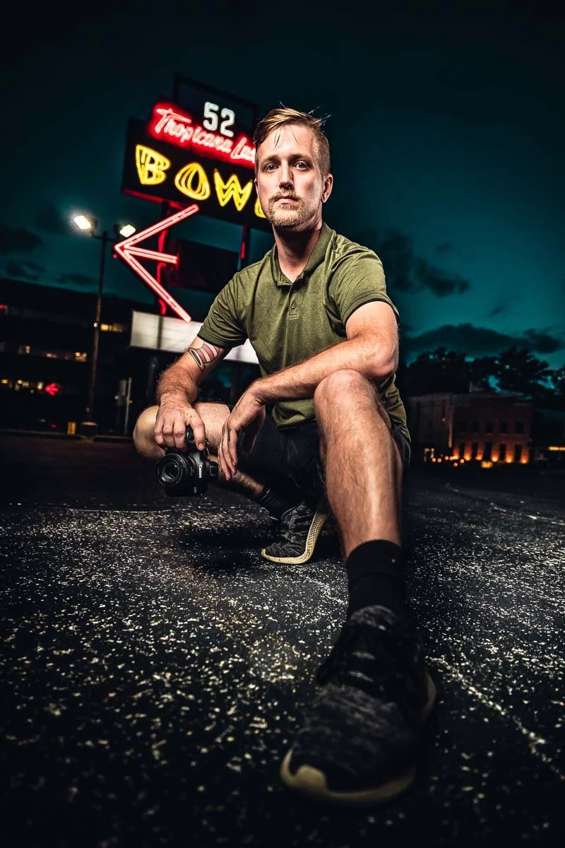 Personal branding portrait of photographer outside