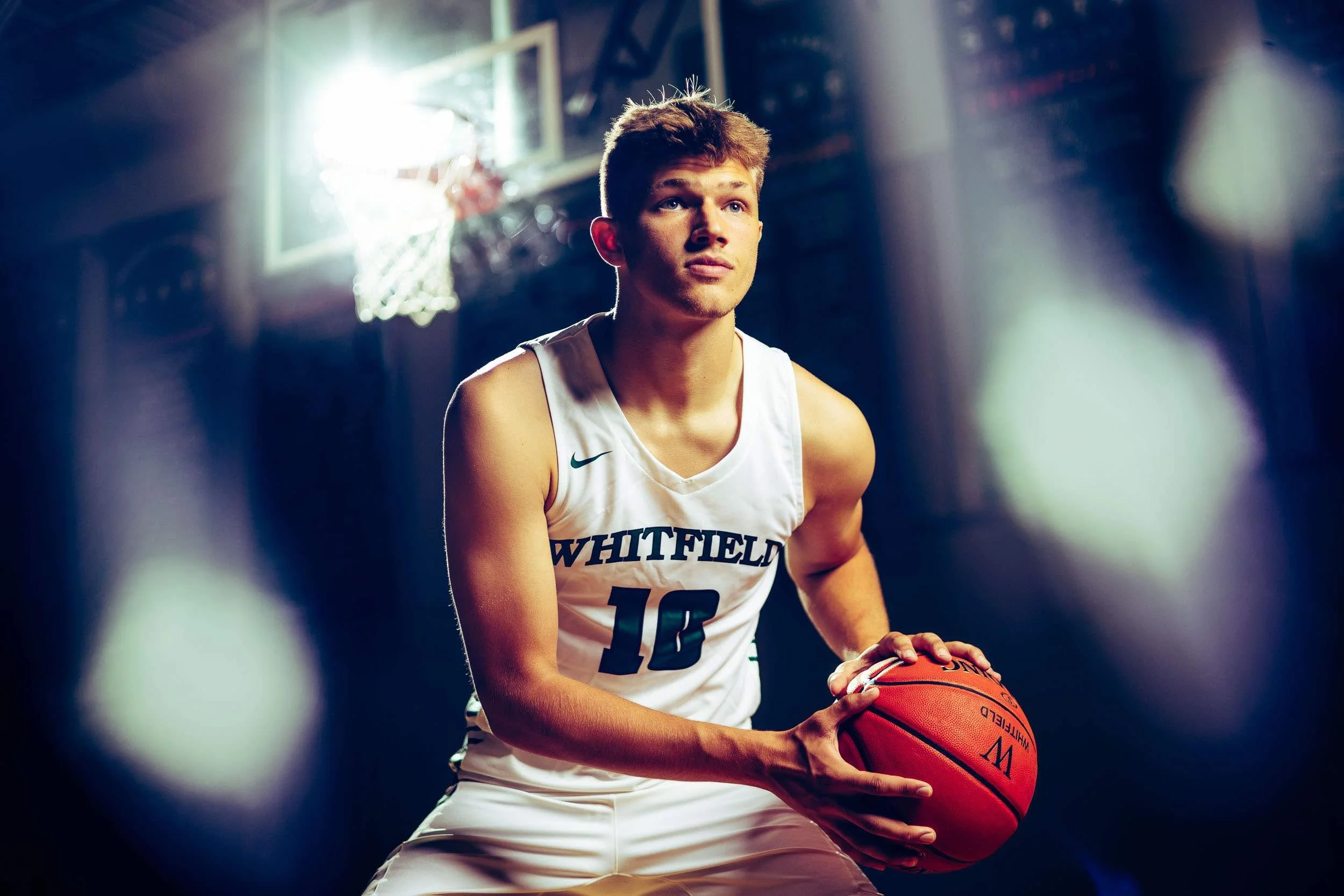 action photo of high school basketball player