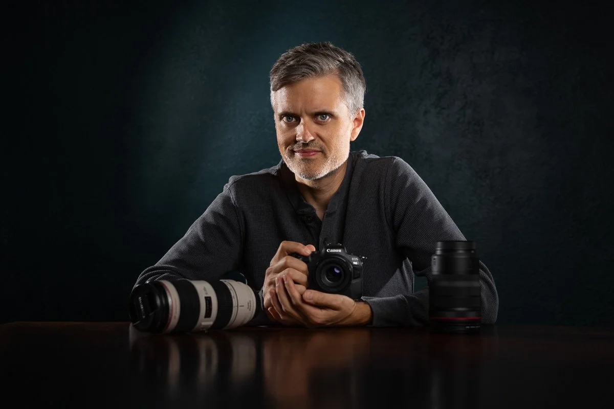 photographer self portrait with stark lighting