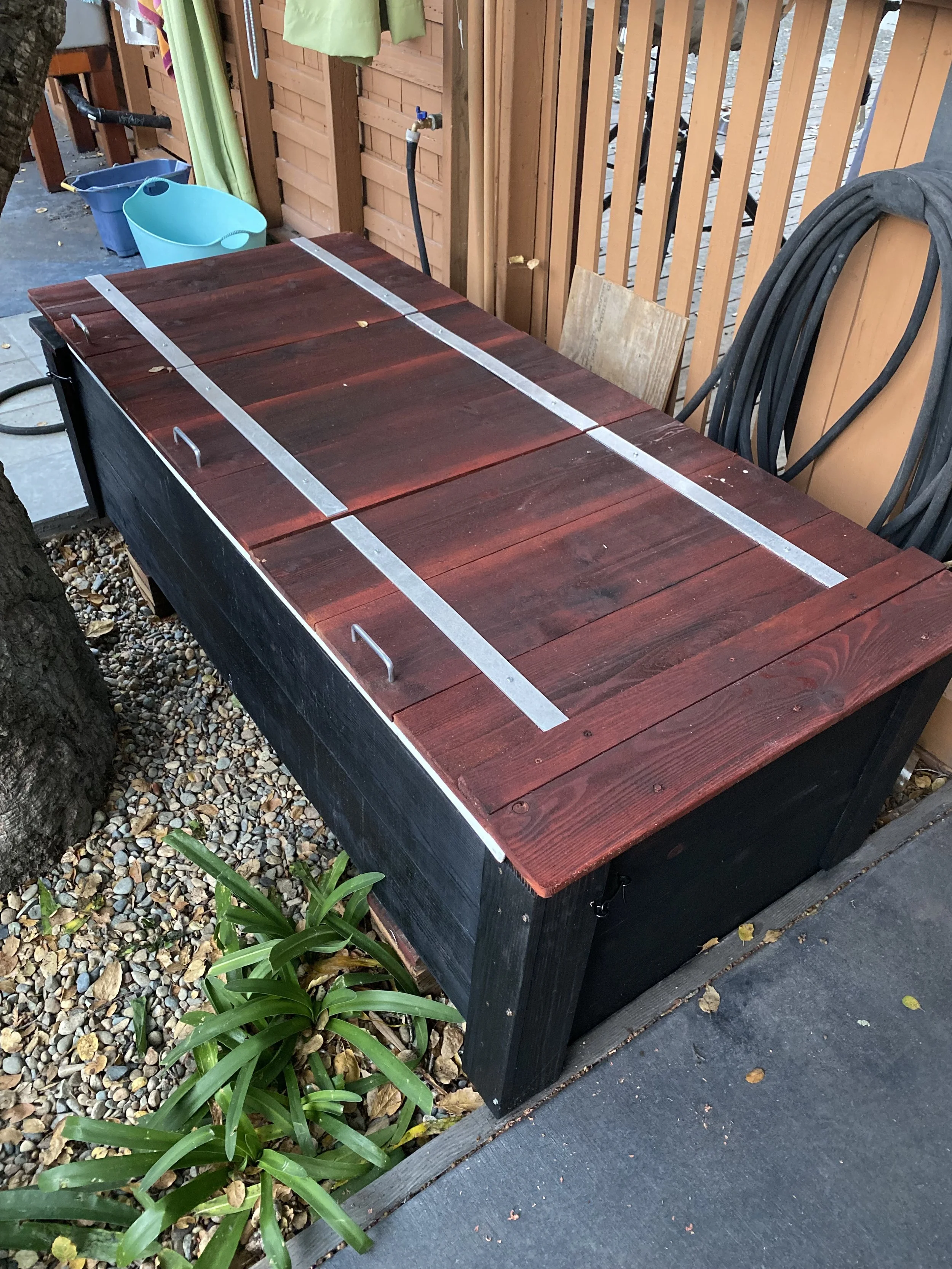 Outdoor tub then convered by redwood and sho shugi ban wood to keep dirt out create a warmer effect