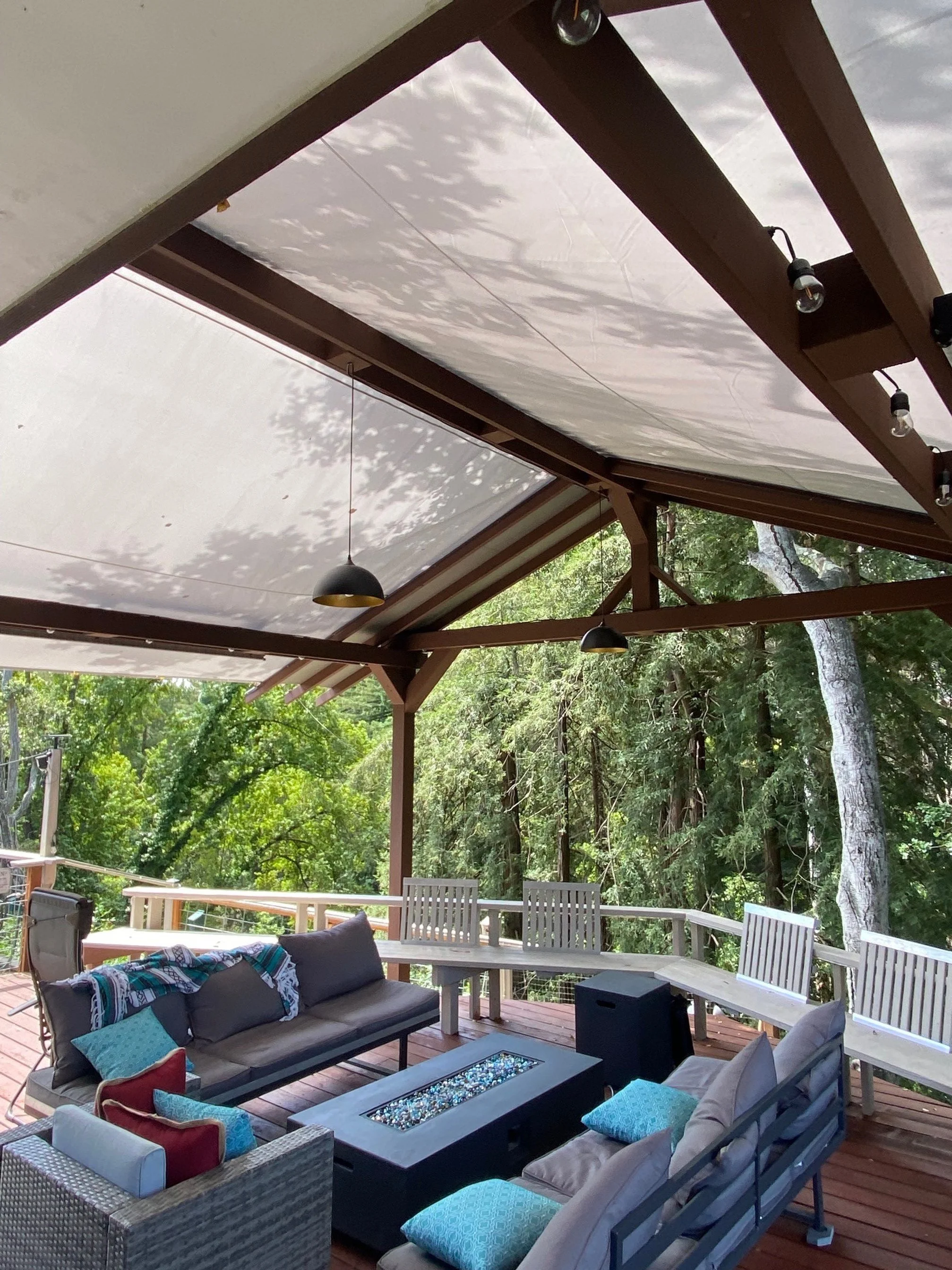 Outdoor living room extension initially with tent fabric, upgraded to see-through plexi-glass